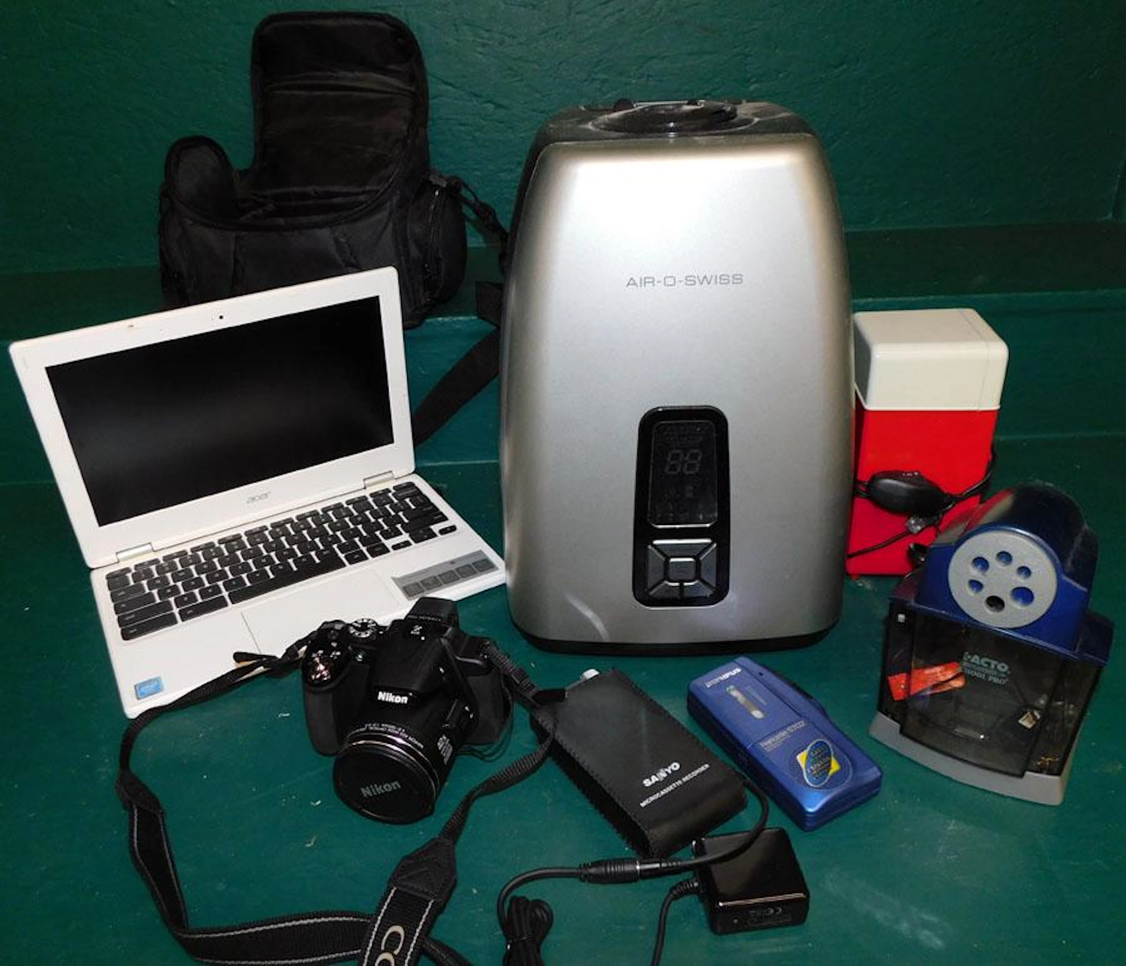 Lot Nikon Camera, Fan,Pencil Sharpener, Laptop,Cooler