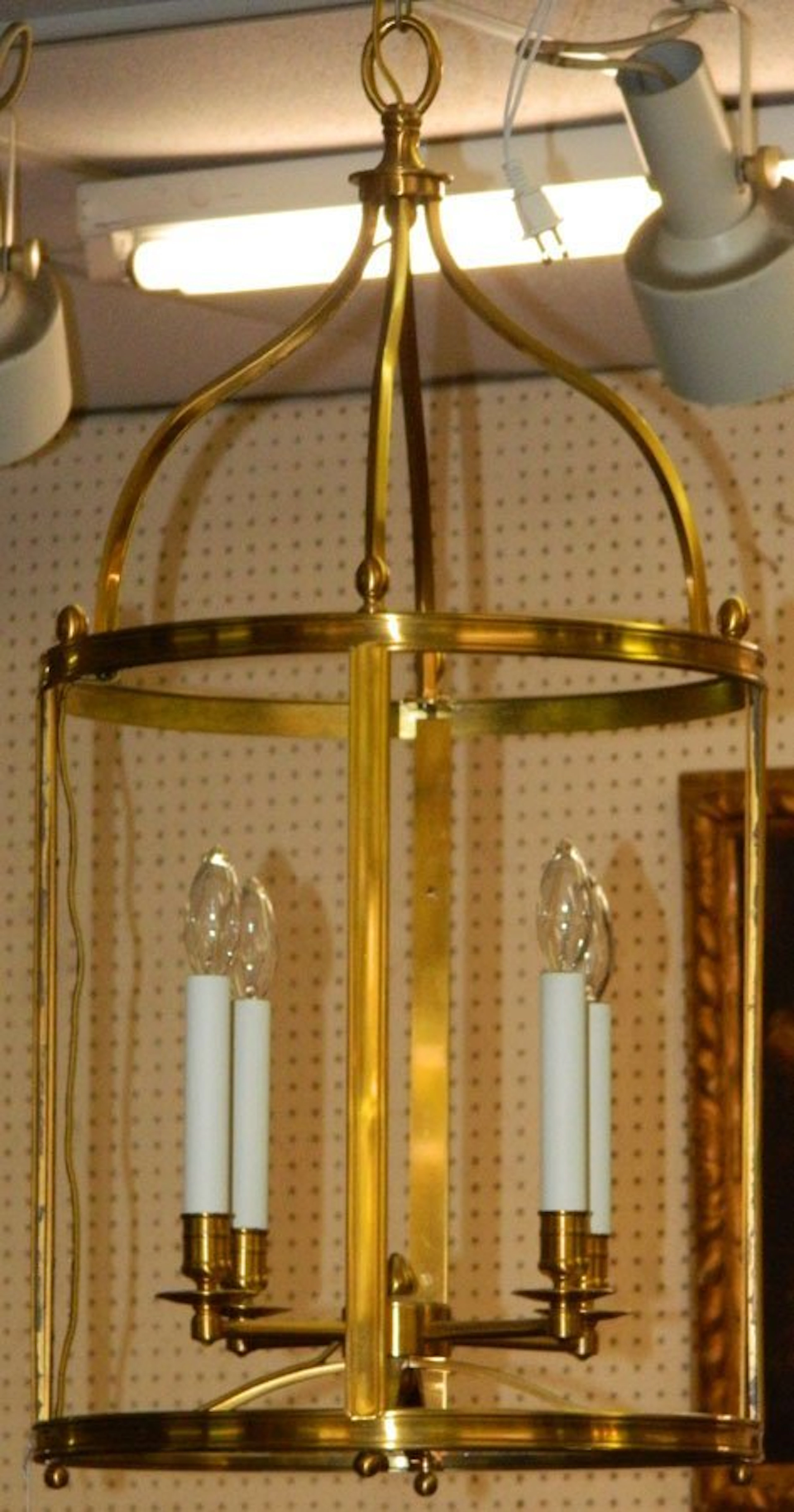 Gilt brass hanging foyer lantern type chandelier.