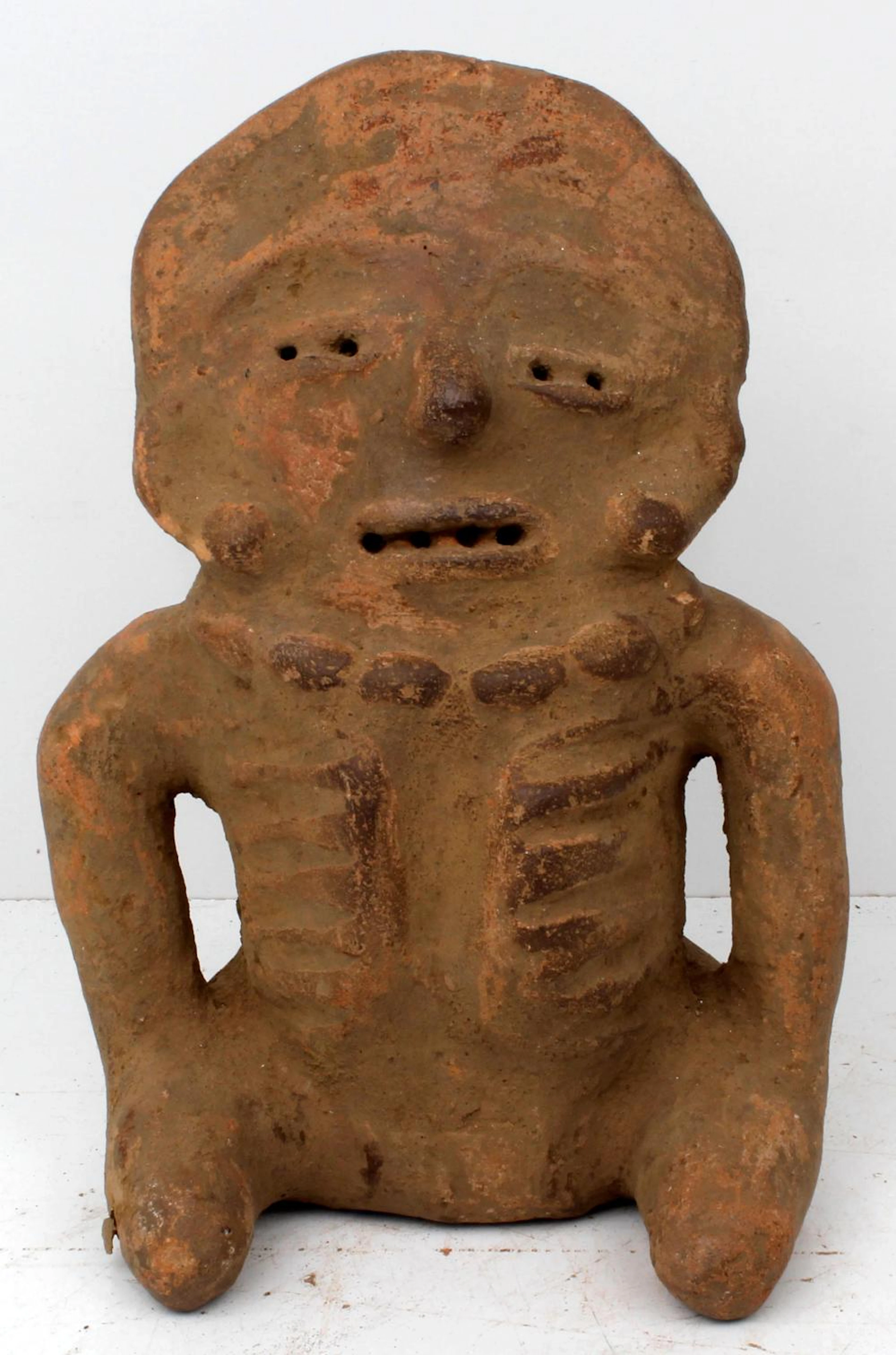 PRECOLUMBIAN SEATED TERRACOTTA DEATH FIGURE