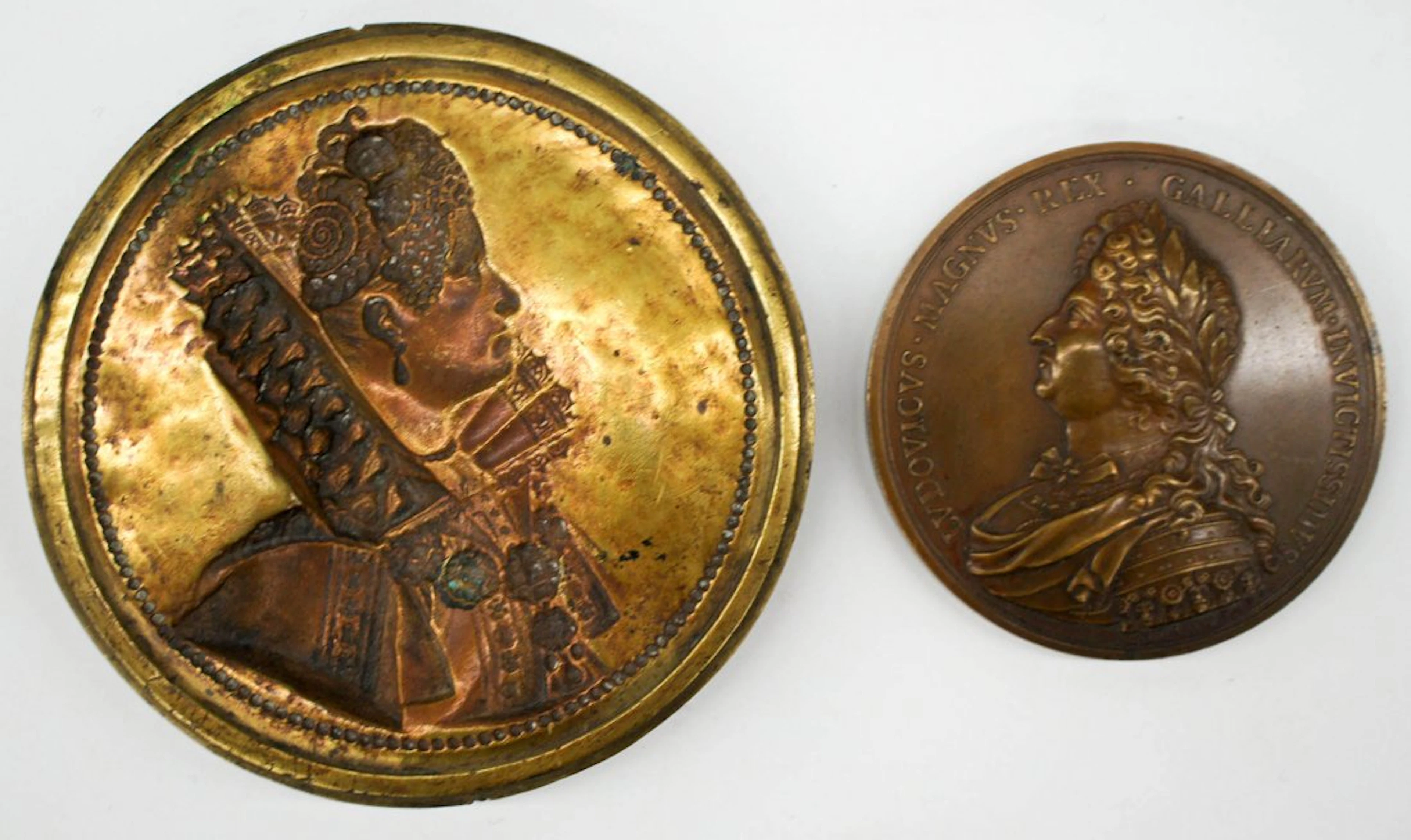 (2) Antique French Medallions. One solid brass cast