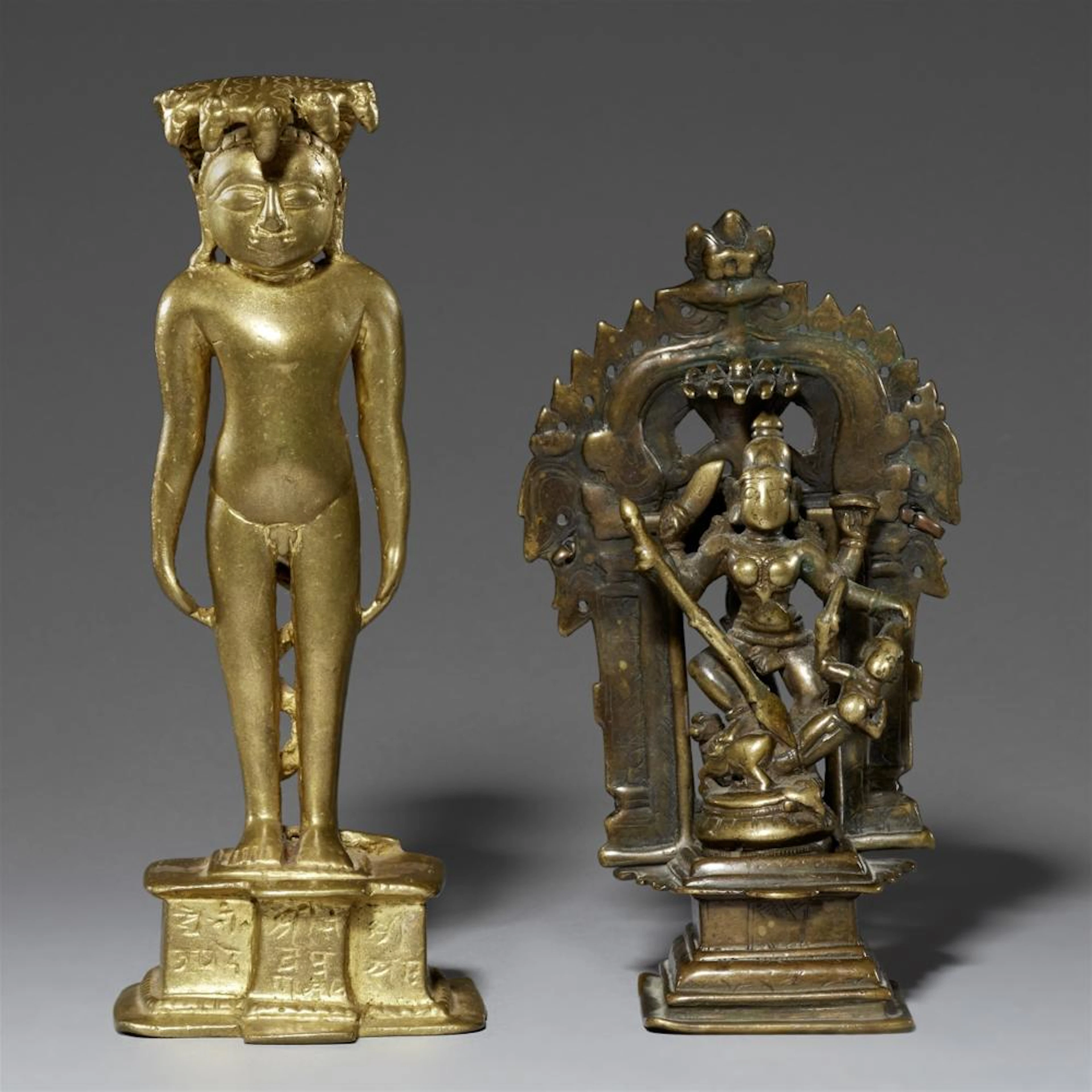A Maharashtra copper ally Jain figure and a Durga altar in three pieces. 17th/19th century