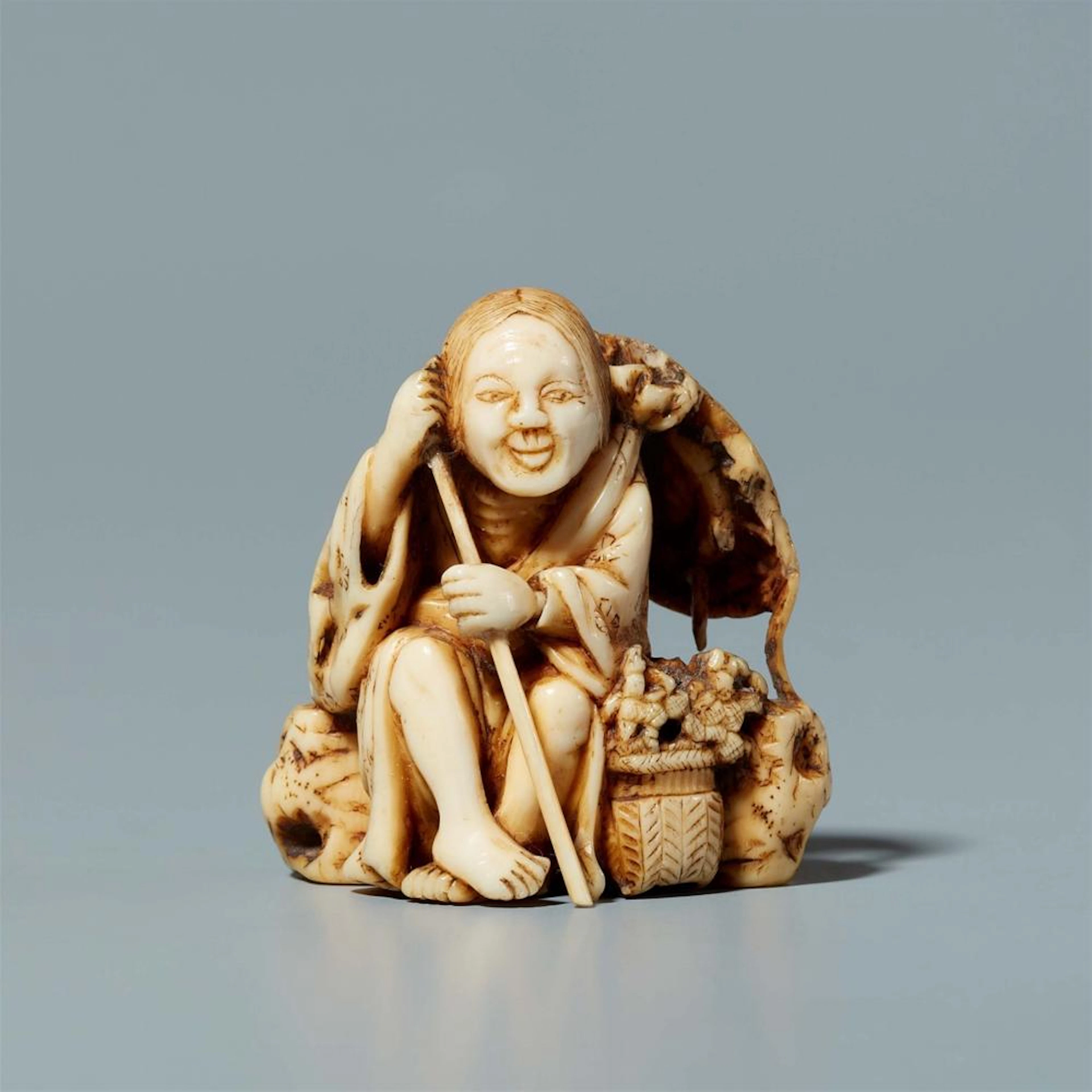 An ivory netsuke of Ono no komachi. Second half 19th century