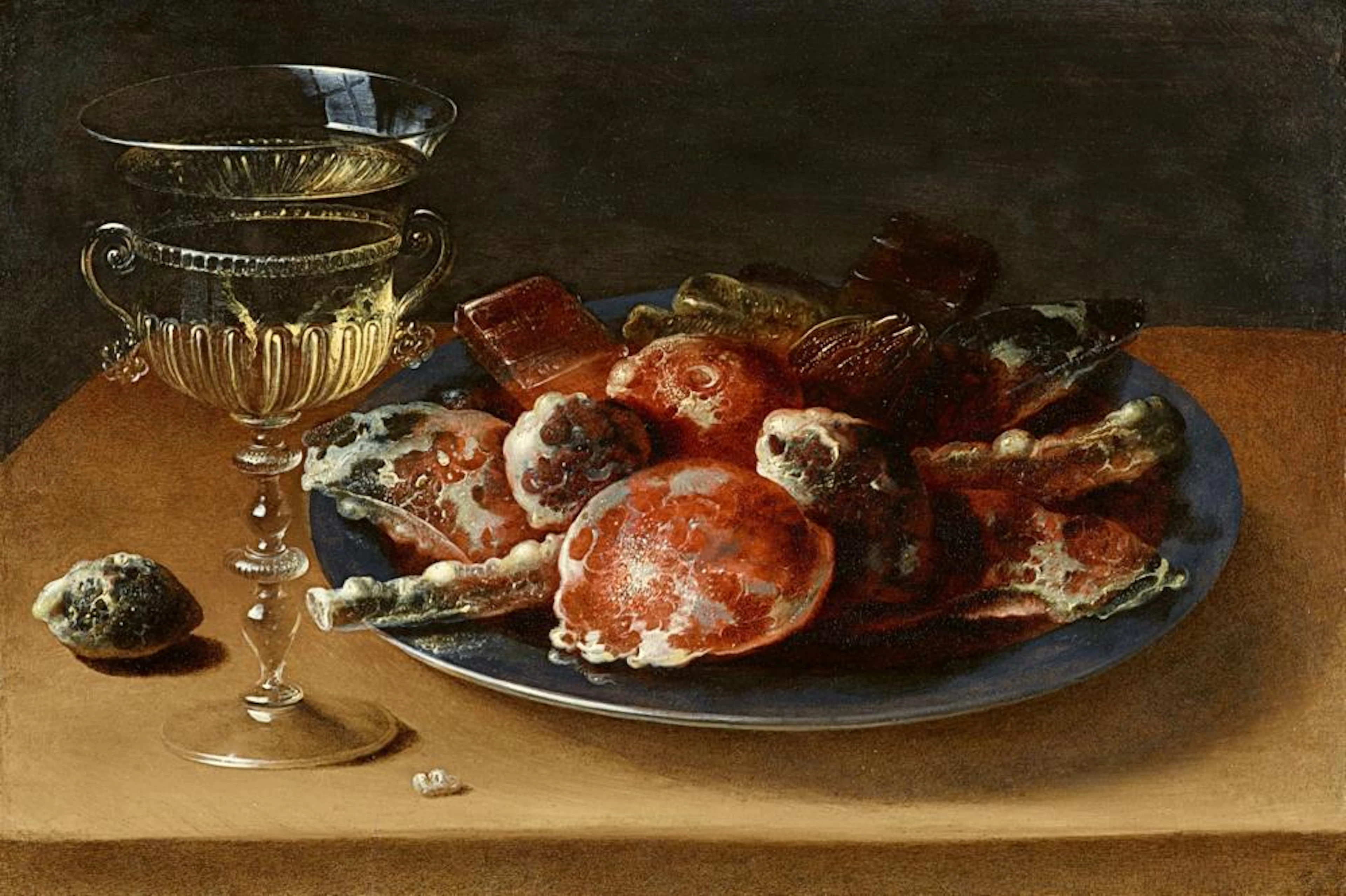 Ossias Beert, Still Life of Sweets on a Pewter Plate and a Façon de Venise Wineglass, on a Wooden Ledge
