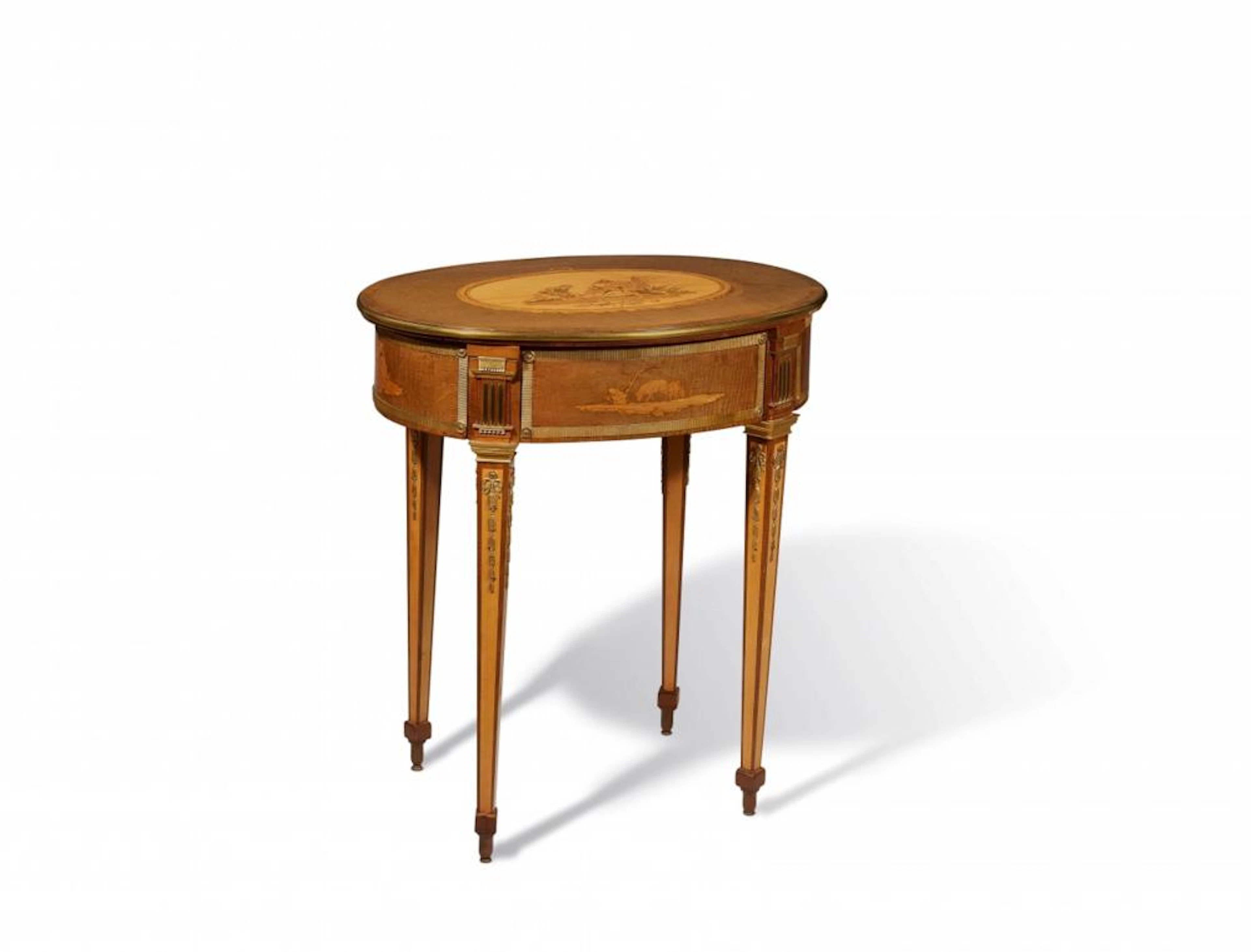 An oval working table by David Roentgen
