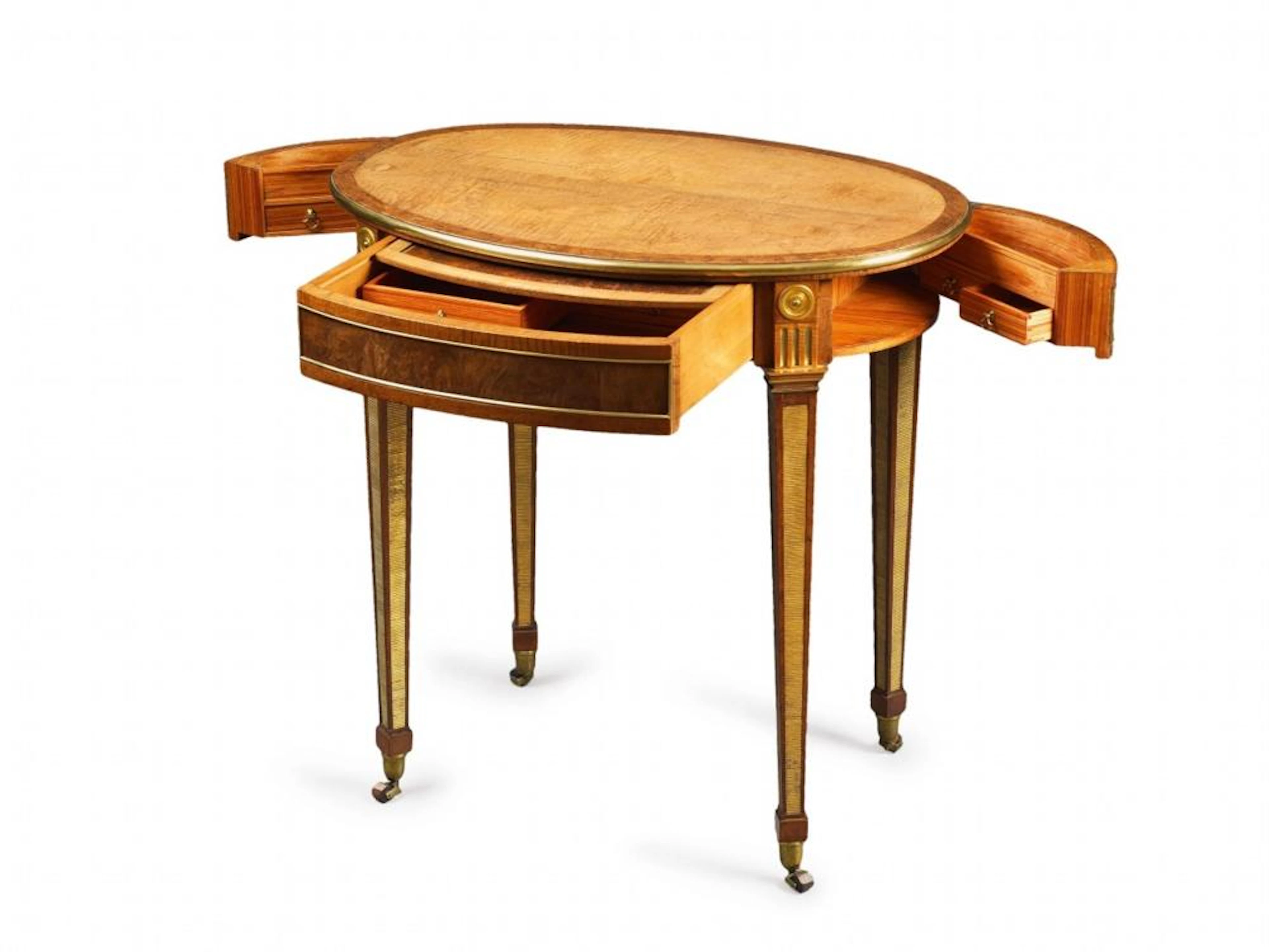 An oval work table by David Roentgen