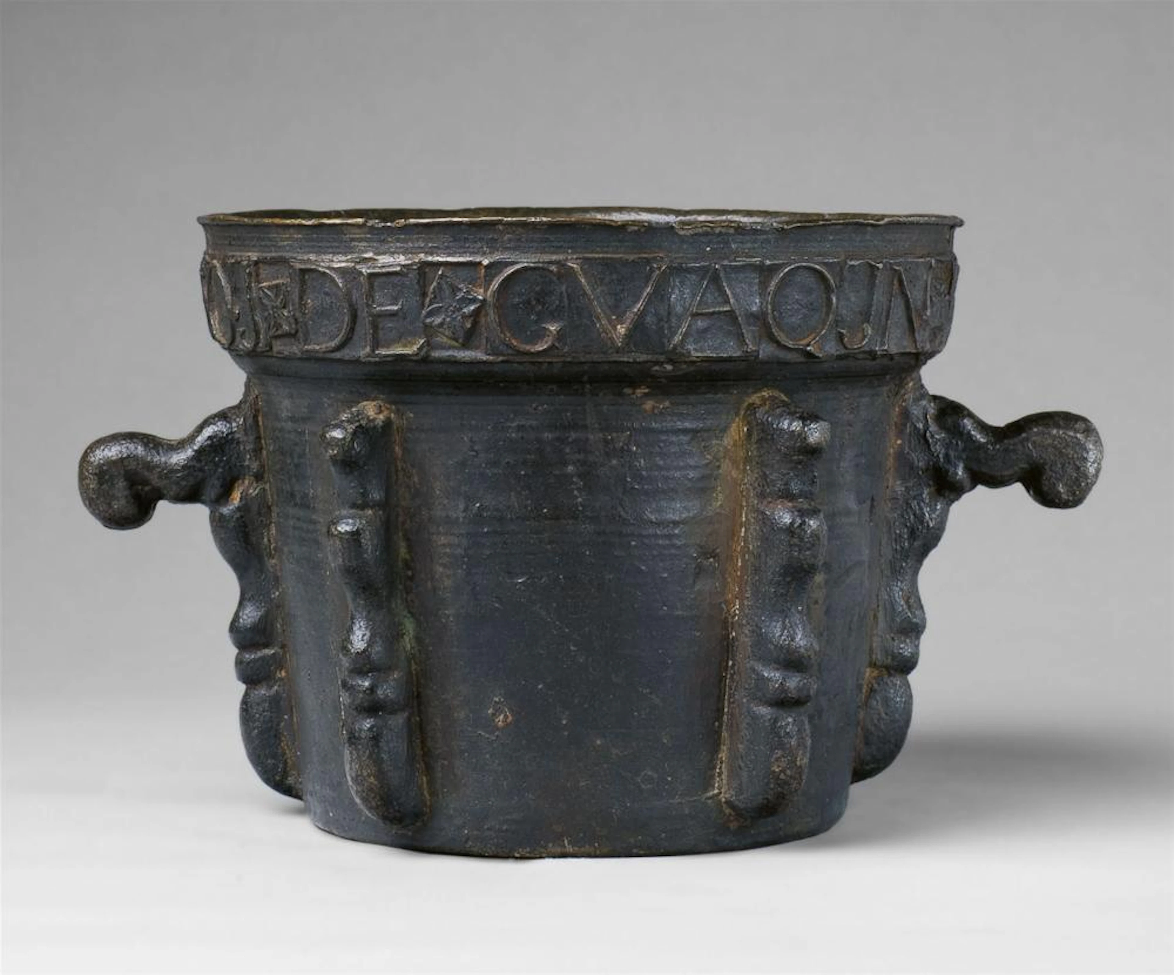 A large Spanish ribbed mortar dated 1776