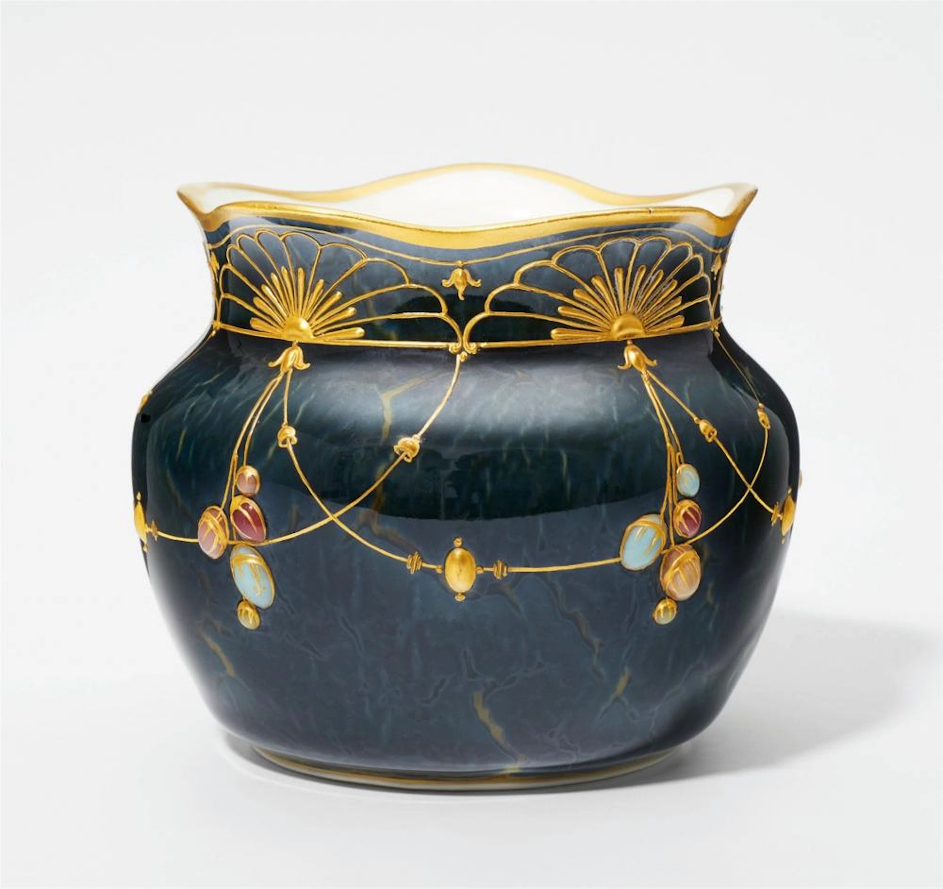 A Berlin KPM porcelain dish with enamel cabochons