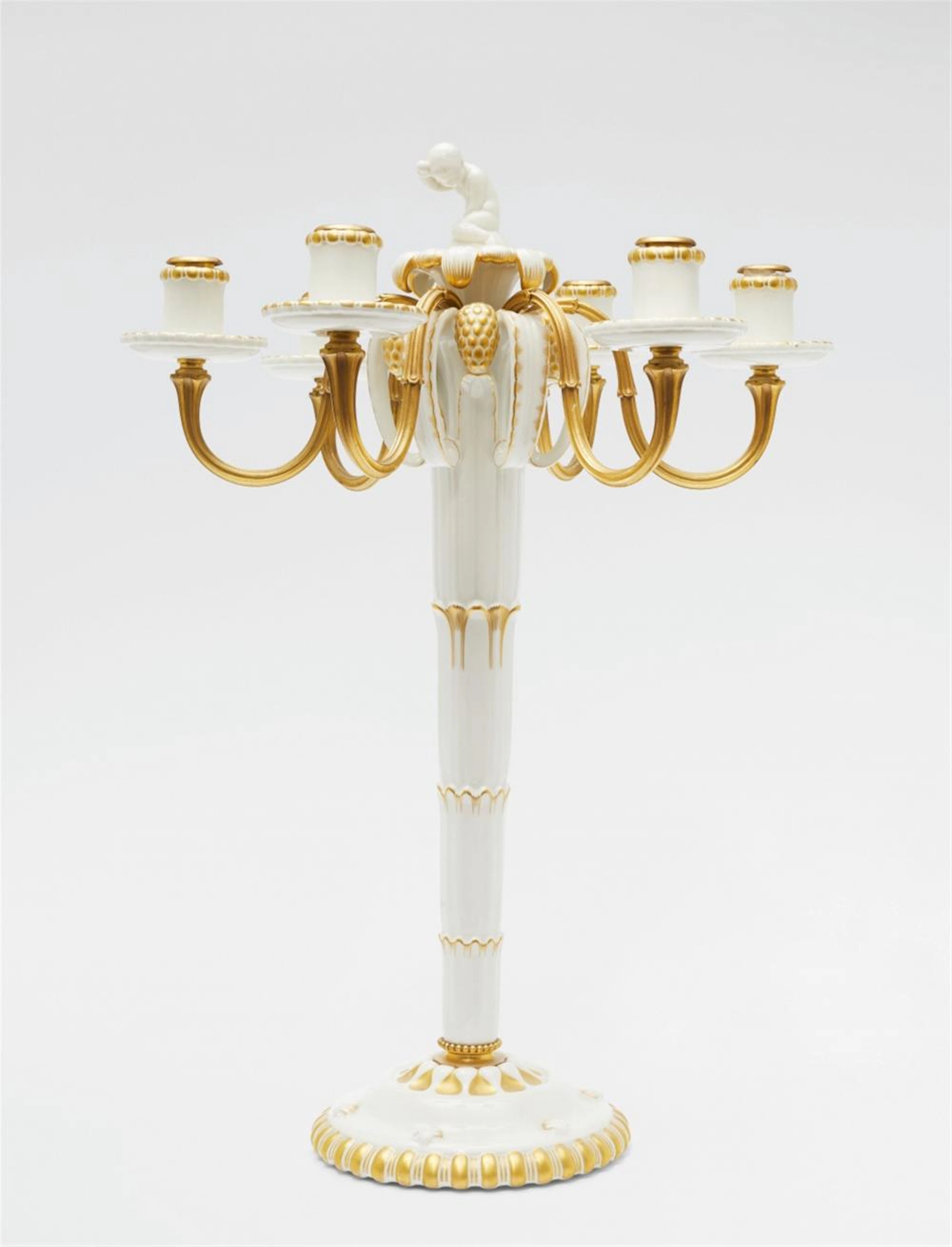 A Berlin KPM porcelain candelabrum from Amberg's centrepiece