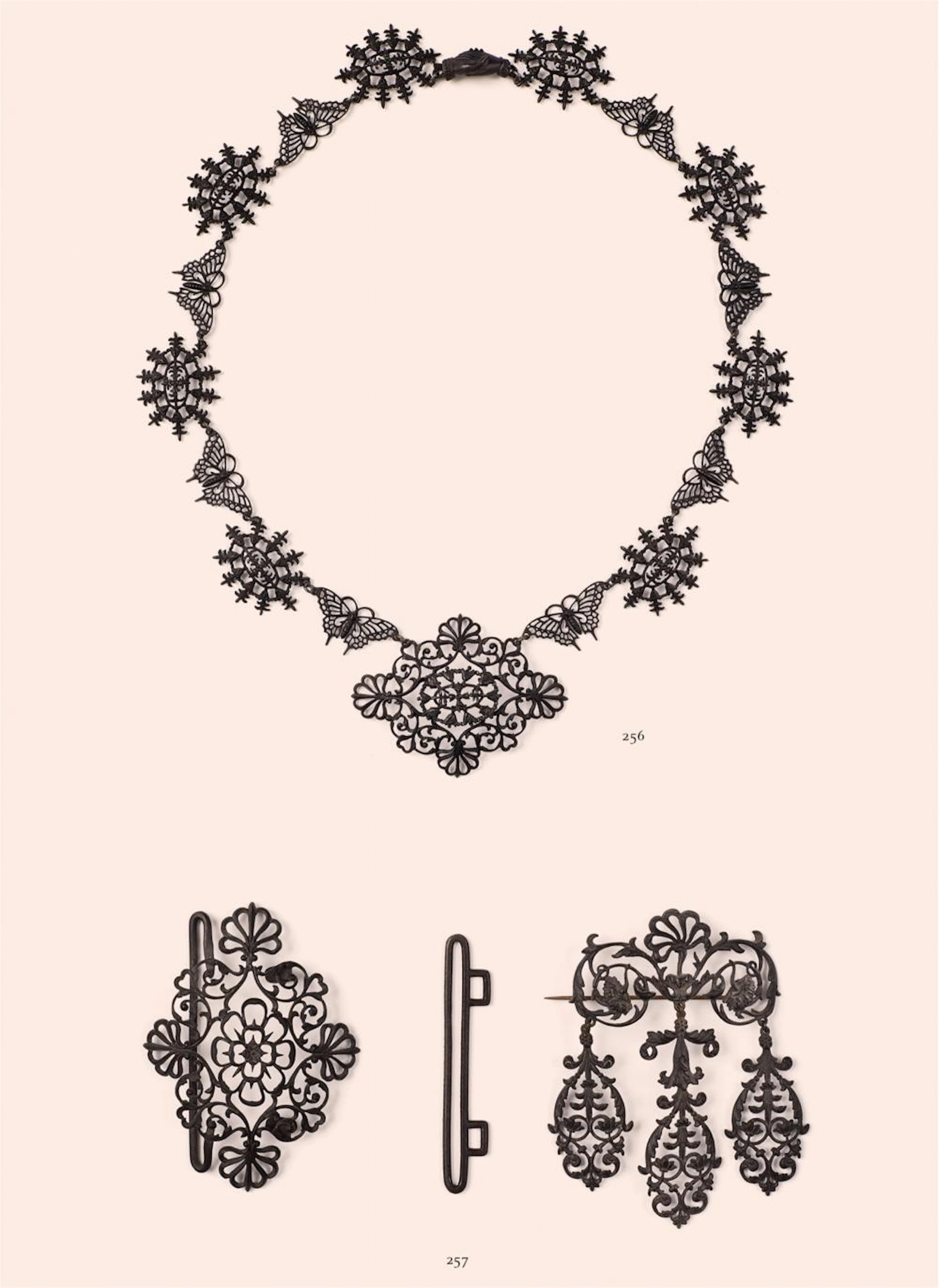A cast iron necklace with butterflies