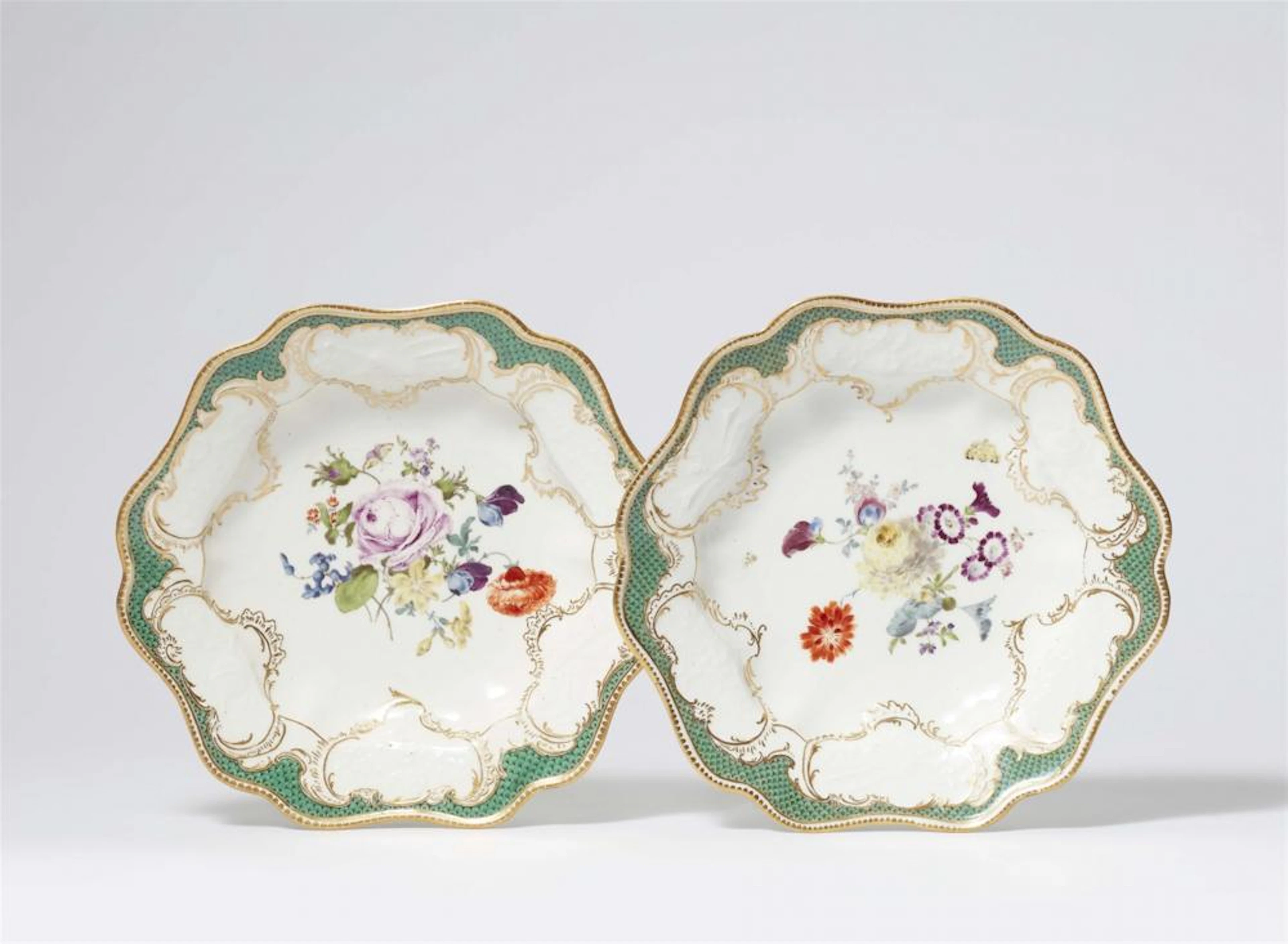 Two Meissen porcelain dishes from a service with green mosaic borders