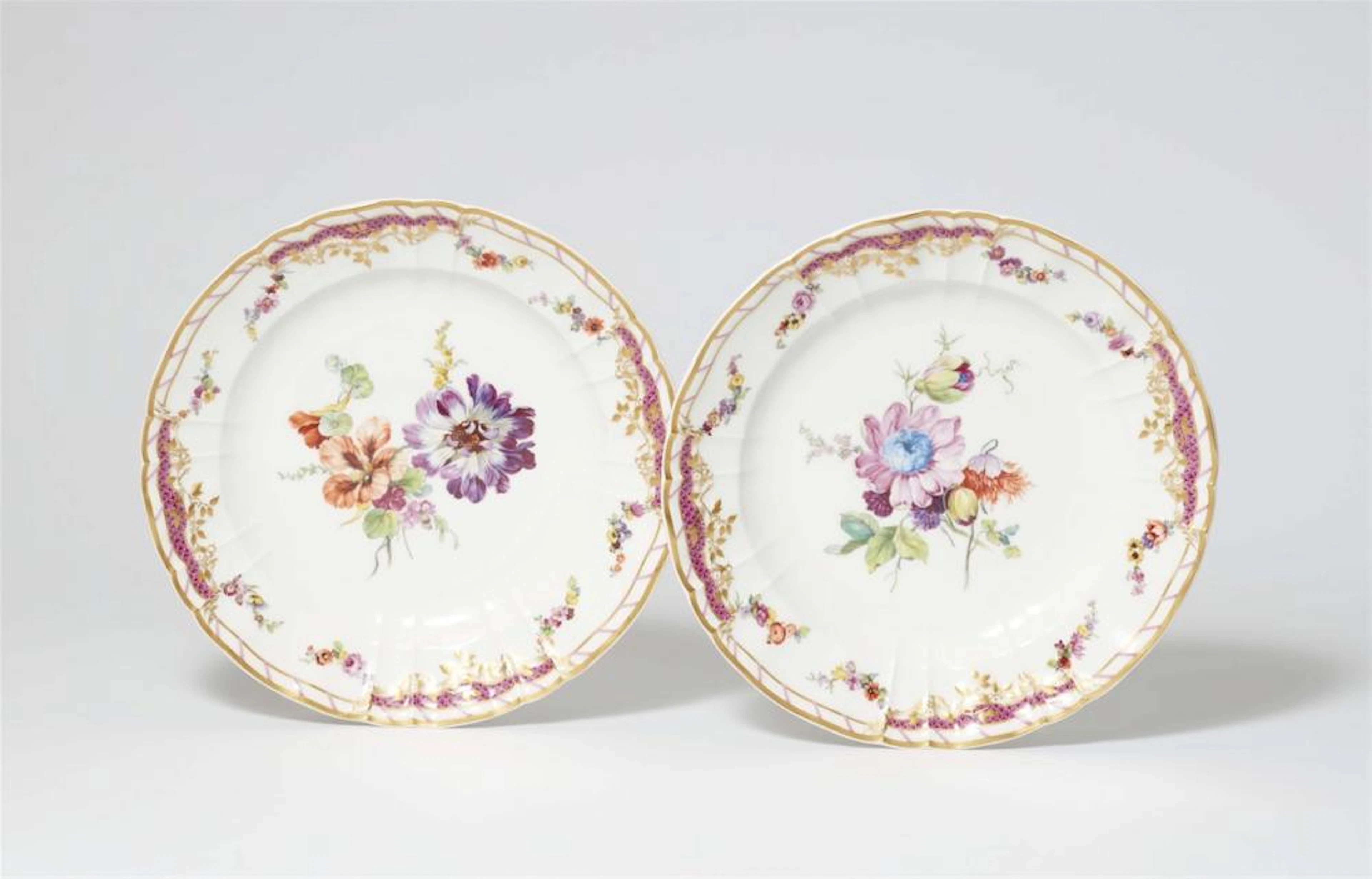 A pair of Berlin KPM porcelain dinner plates from the dinner service for Pope Pius XI