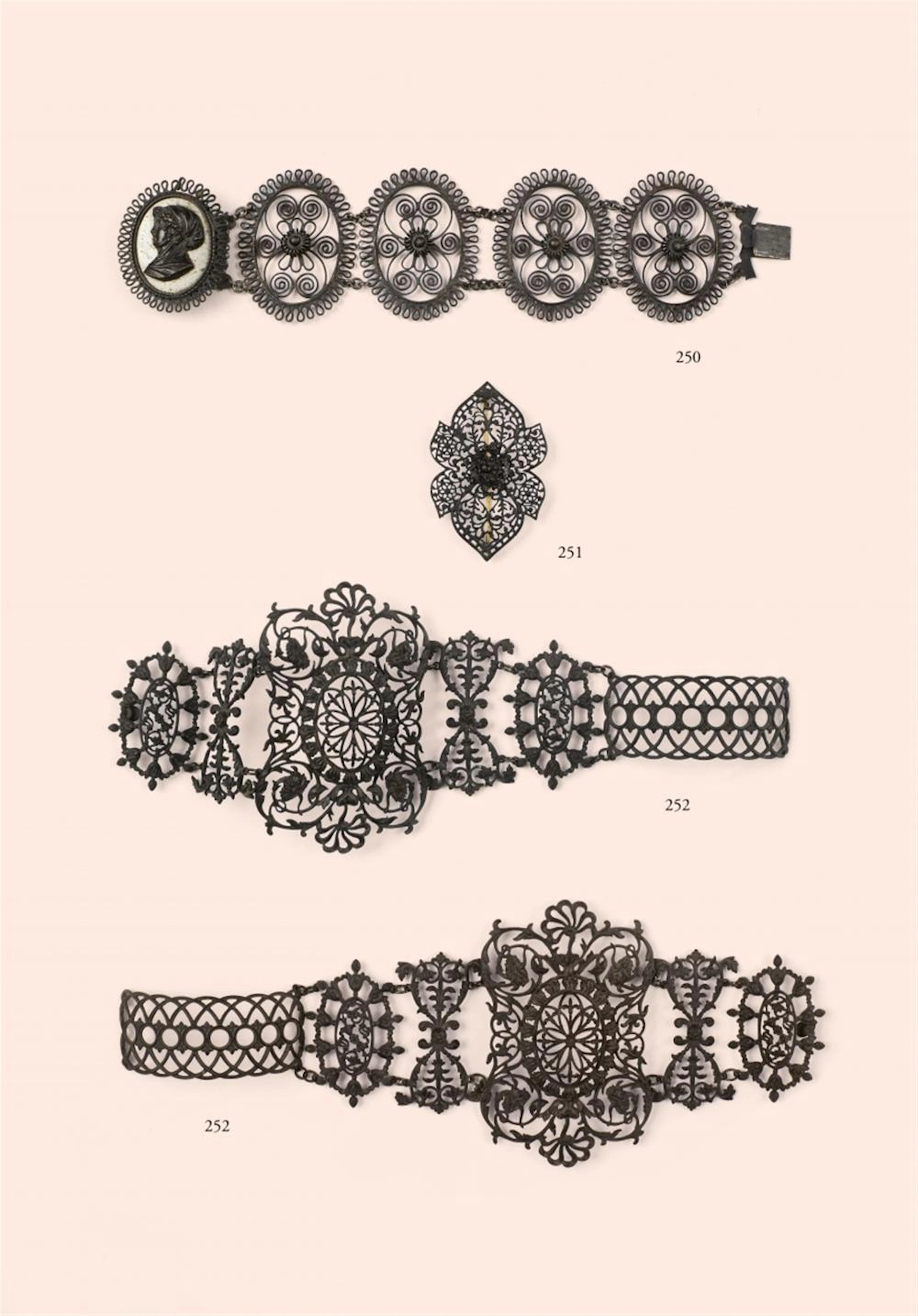 A floral cast iron brooch