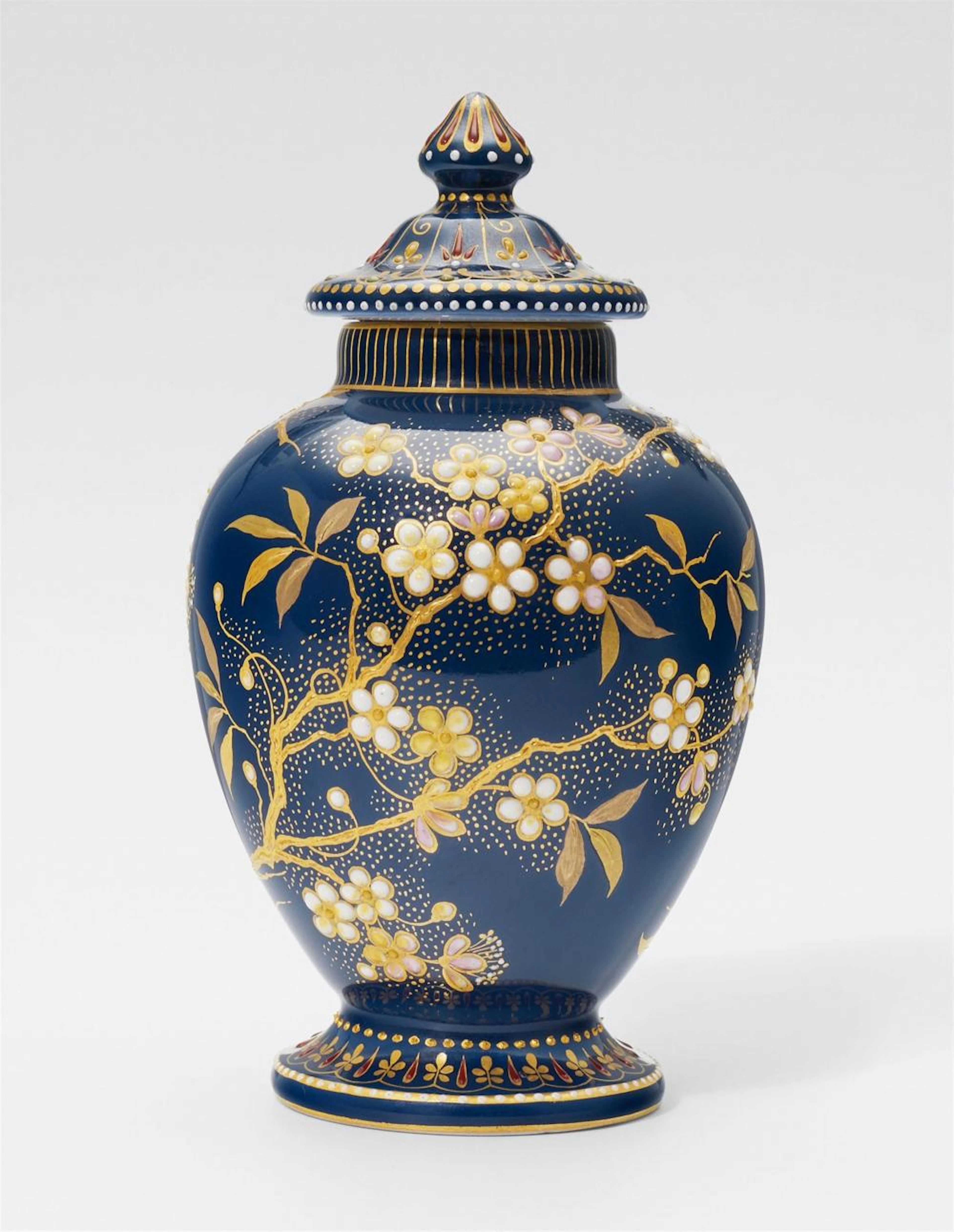 A small Berlin KPM porcelain vase with cherry blossom reliefs