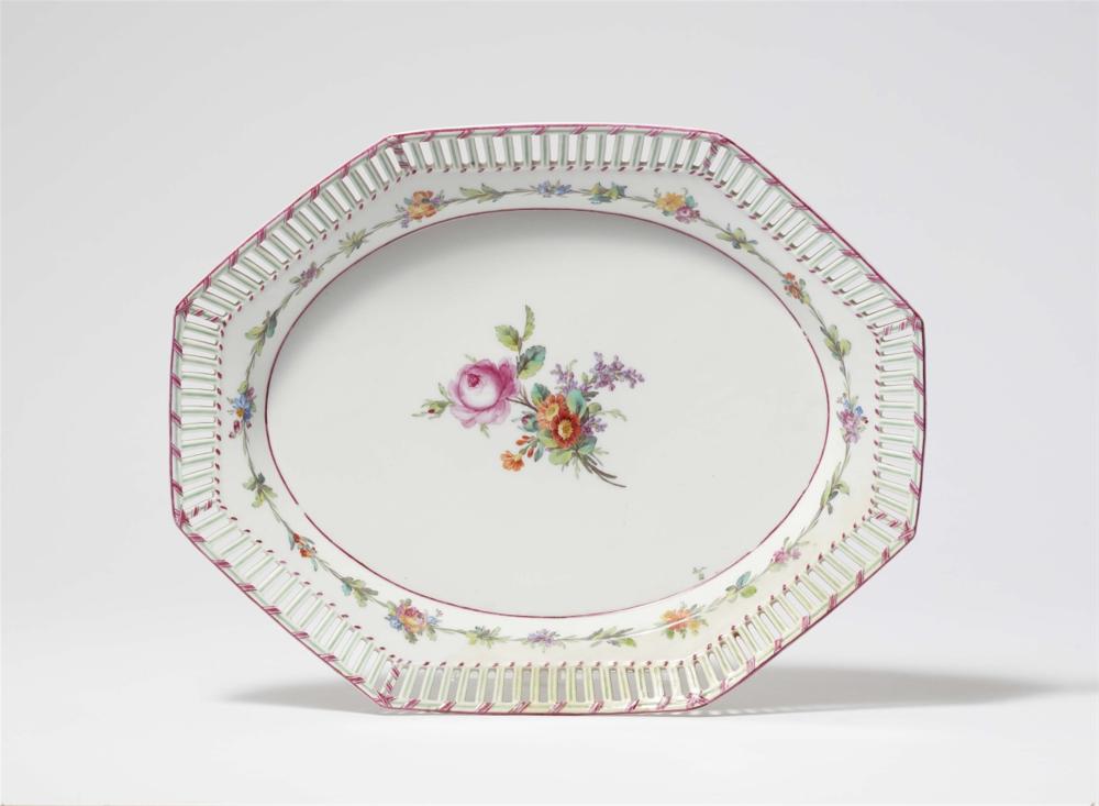 A Berlin KPM porcelain dessert plate from a service with a purple ribbon and flowers