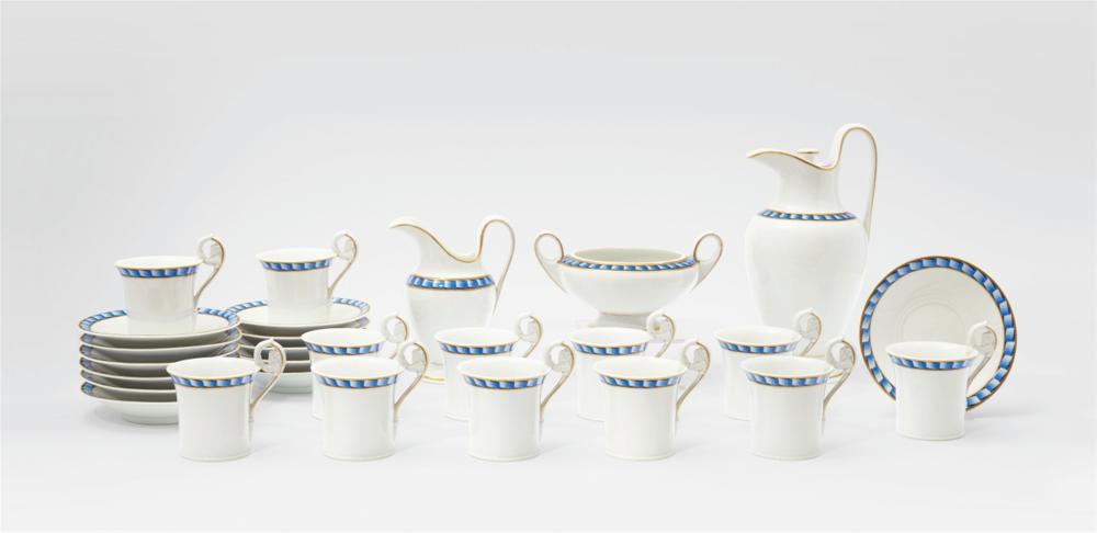 A Berlin KPM porcelain coffee service with blue ribbon borders