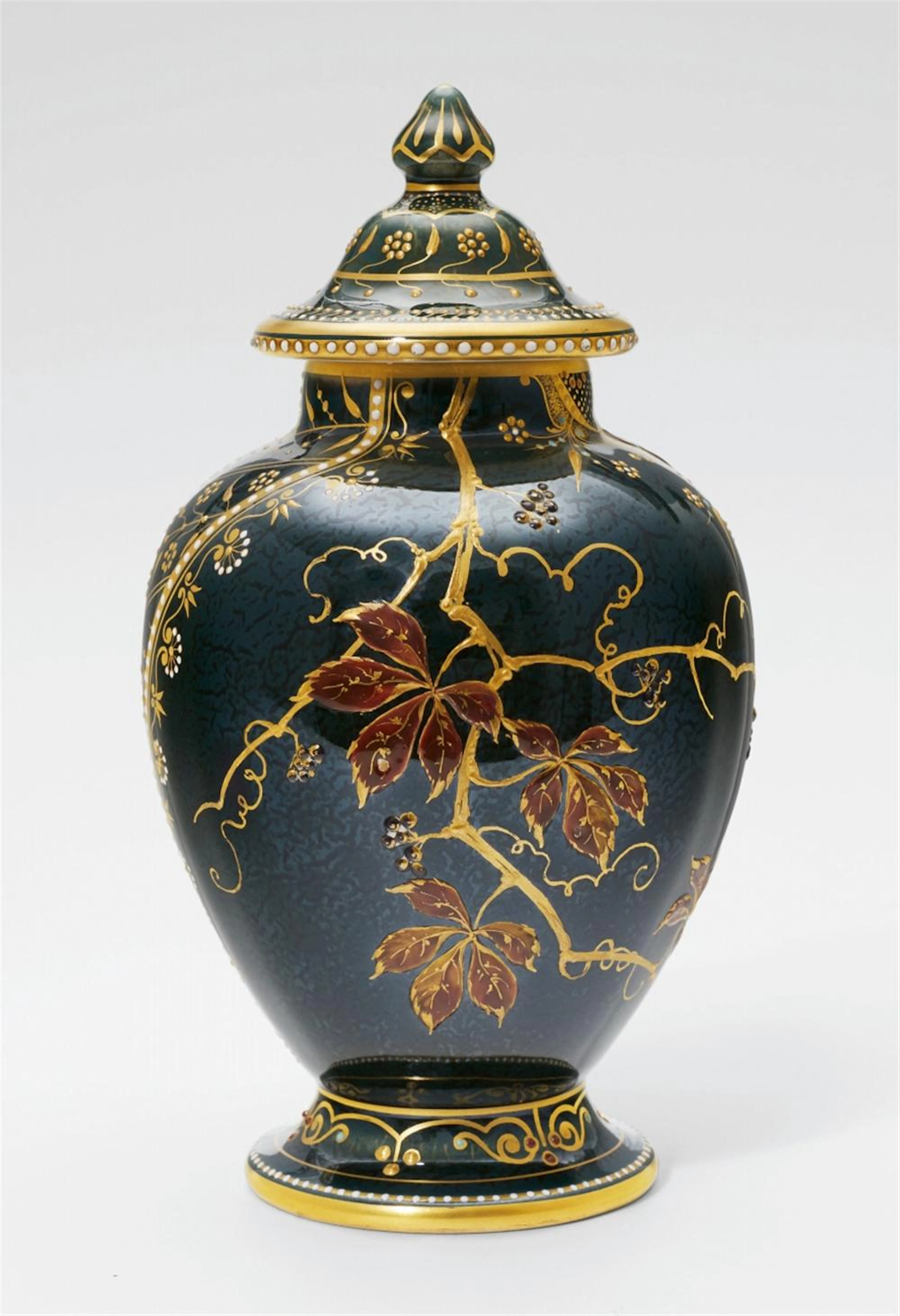 A Berlin KPM porcelain vase with grapevine reliefs