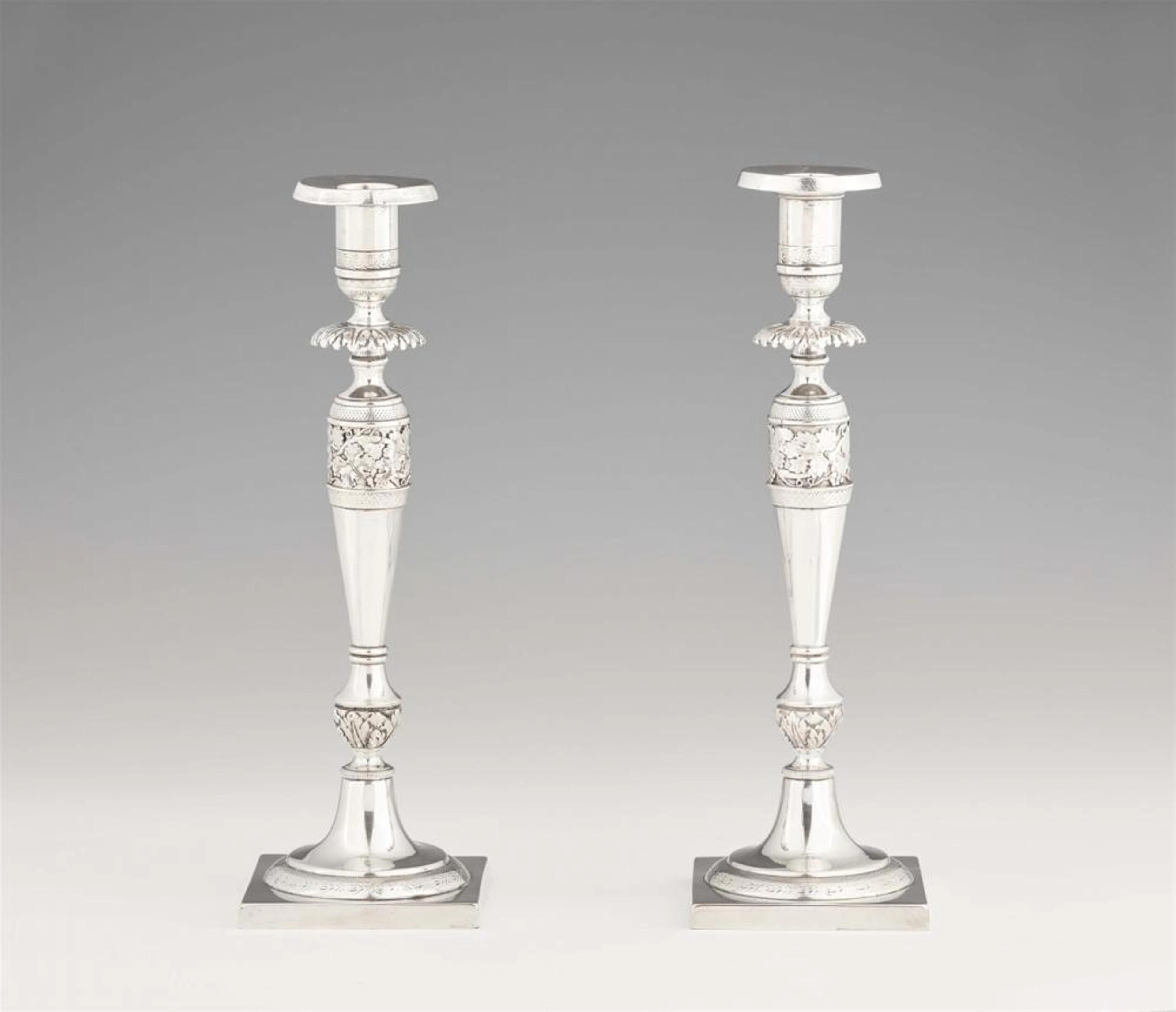 A pair of Neoclassical Berlin silver candlesticks