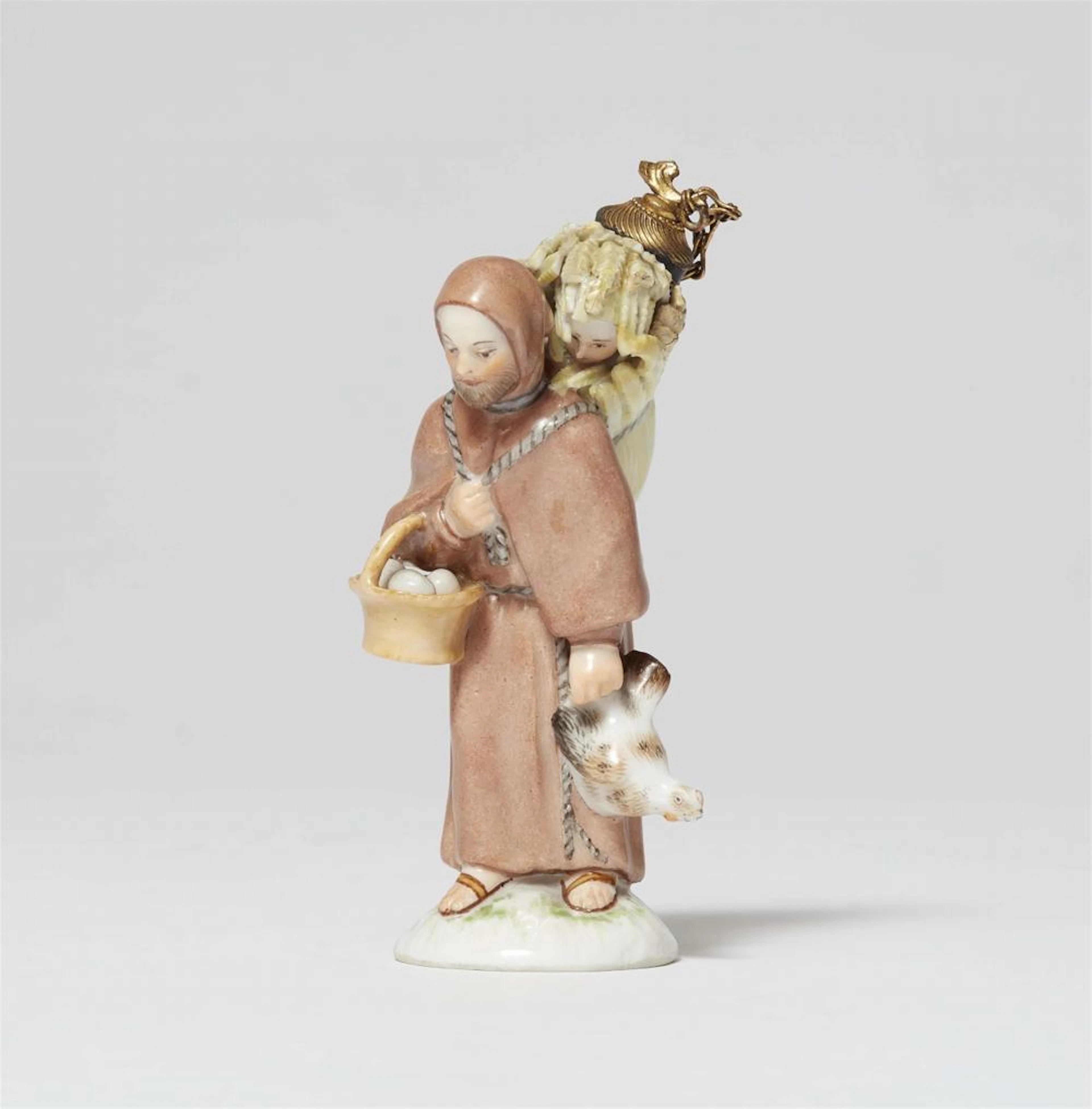 A Berlin KPM porcelain bottle modelled as a monk