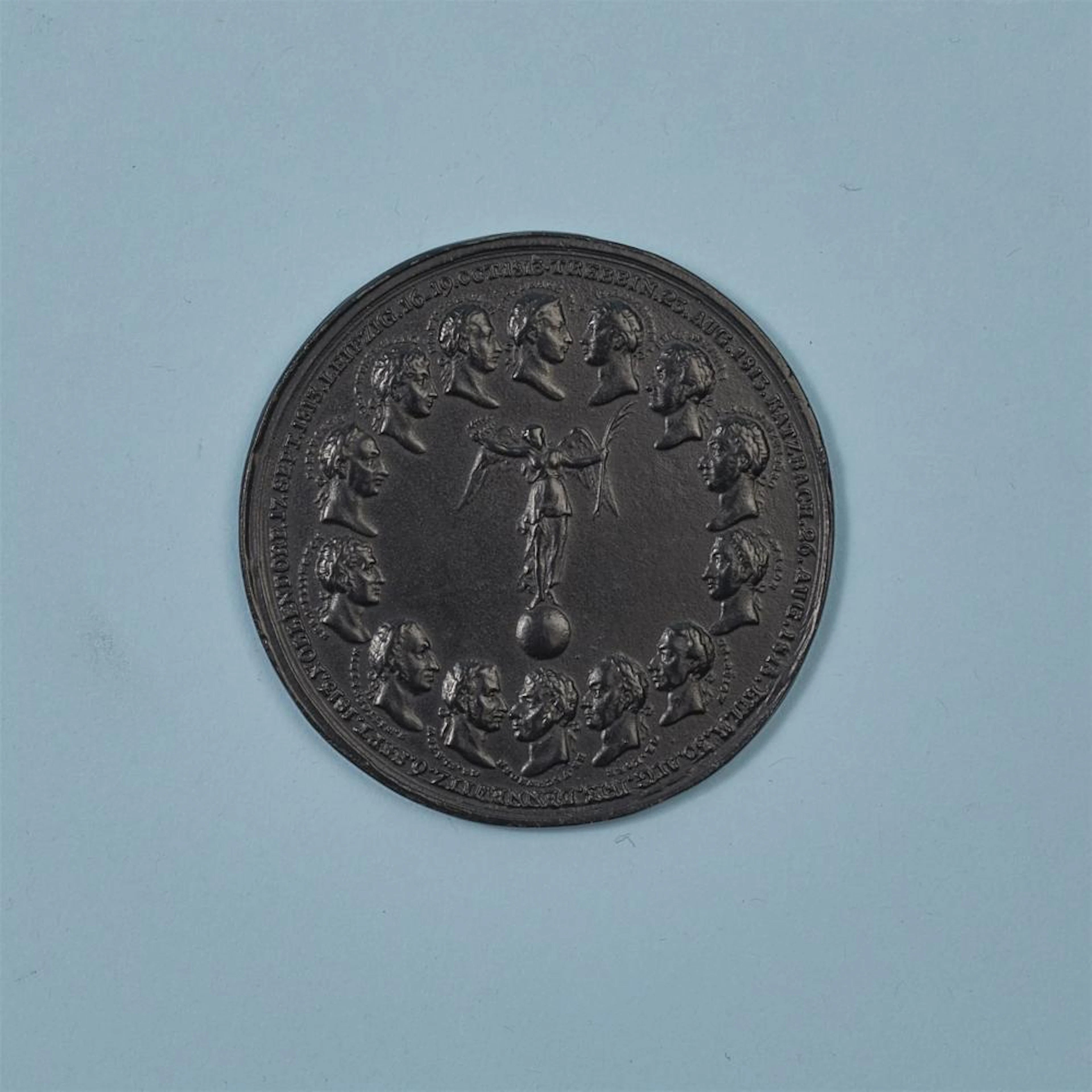 A cast iron coin commemorating the Congress of Vienna 1814