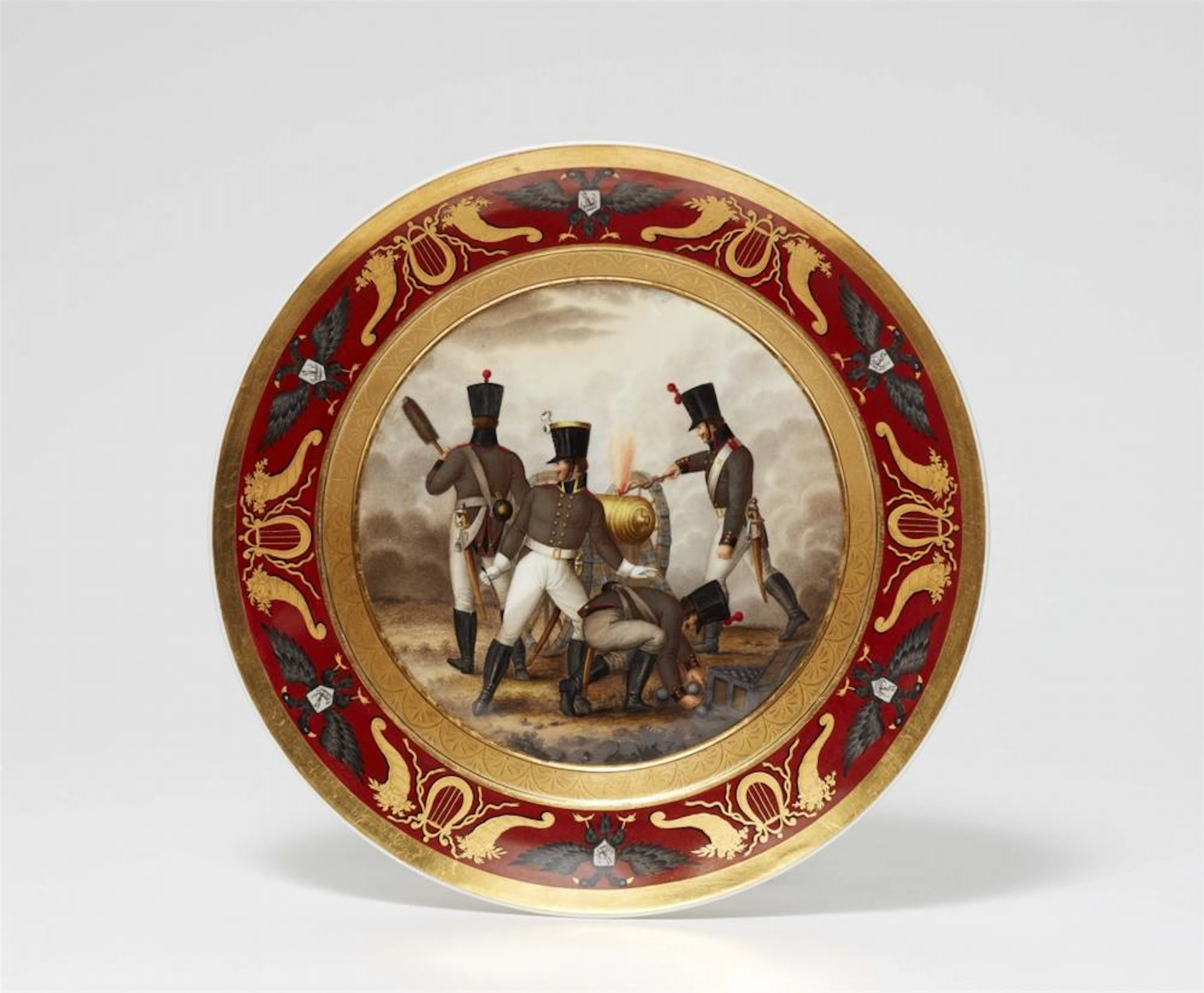 A Berlin KPM porcelain plate with a depiction of Russian artillery soldiers