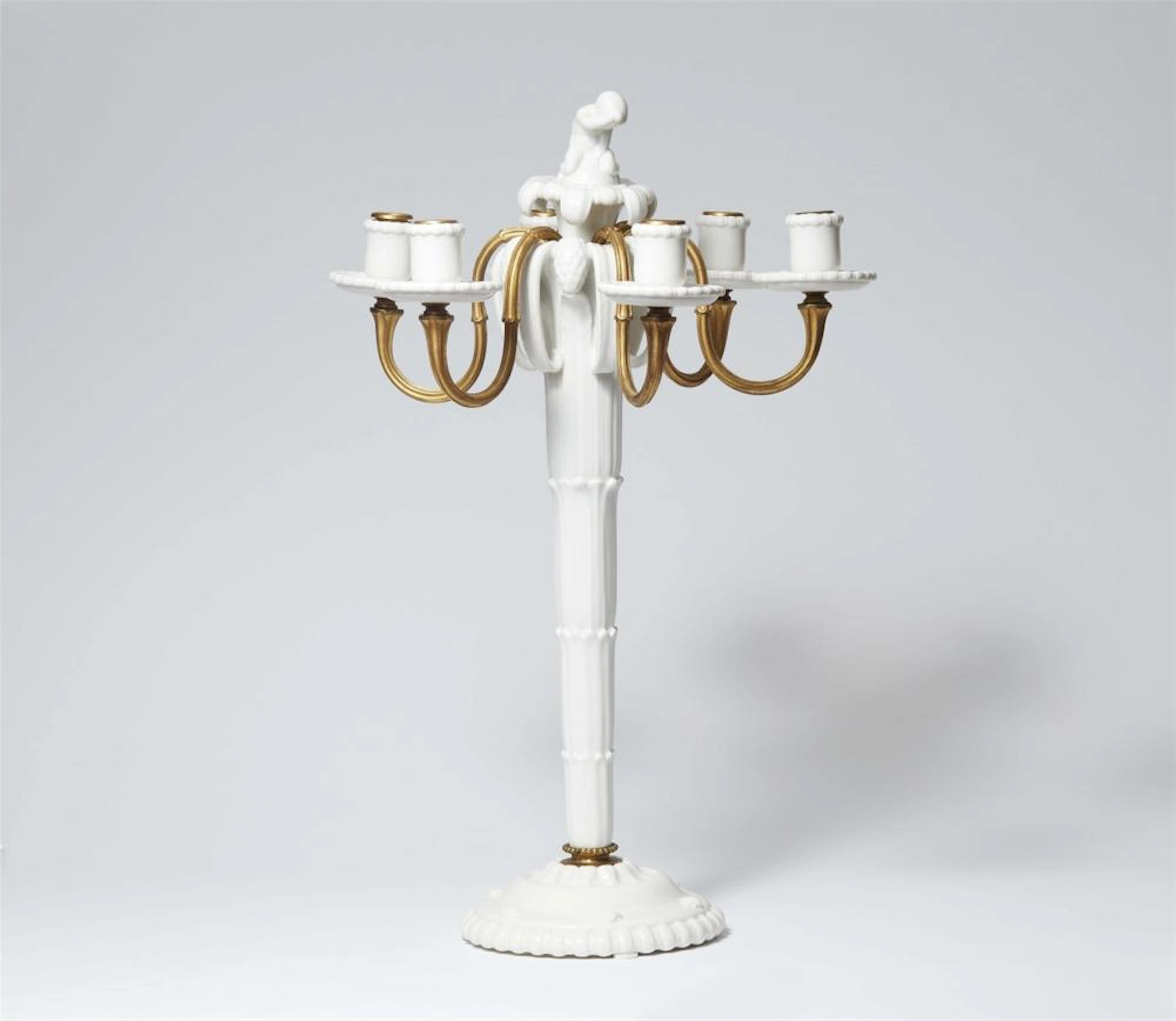A Berlin KPM porcelain candelabra from Amberg's centrepiece