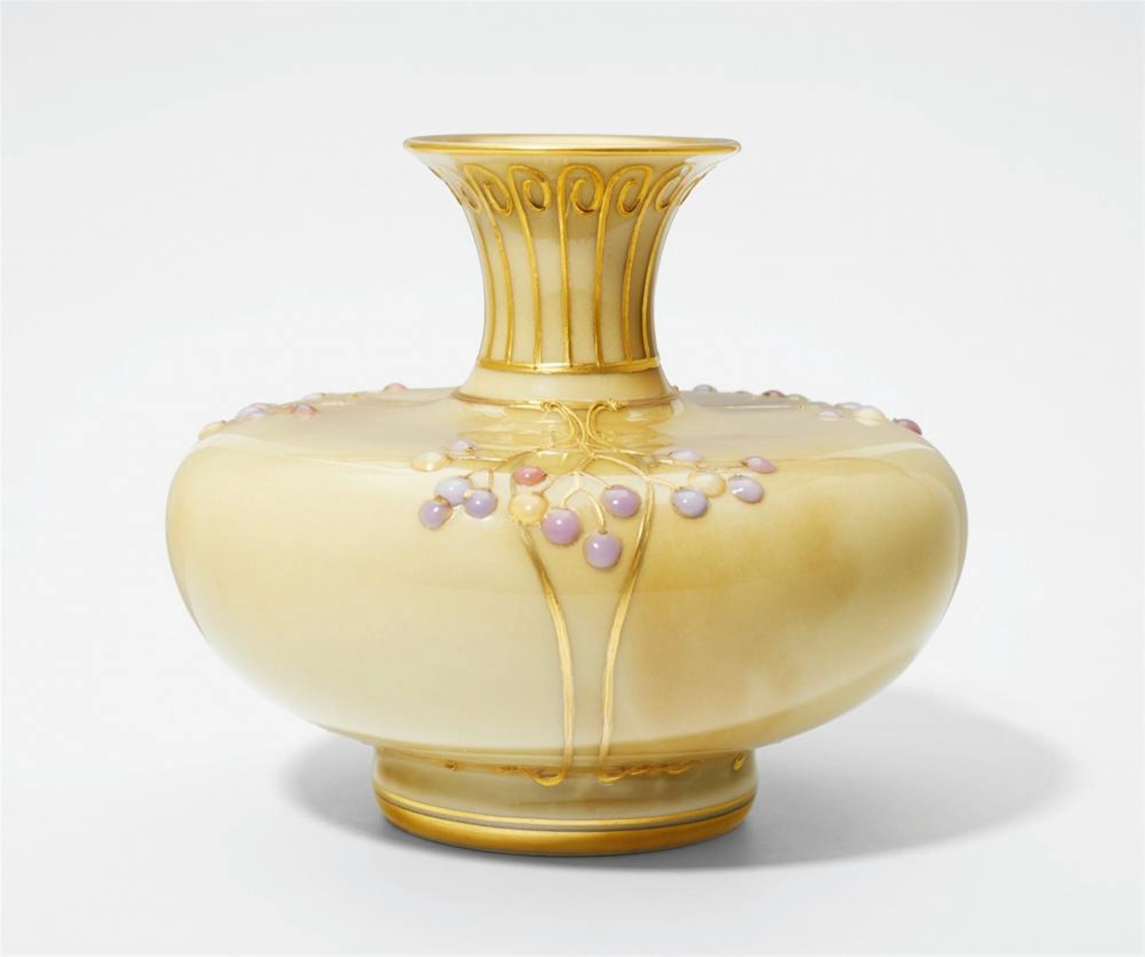 A Berlin KPM porcelain vase with berry motifs