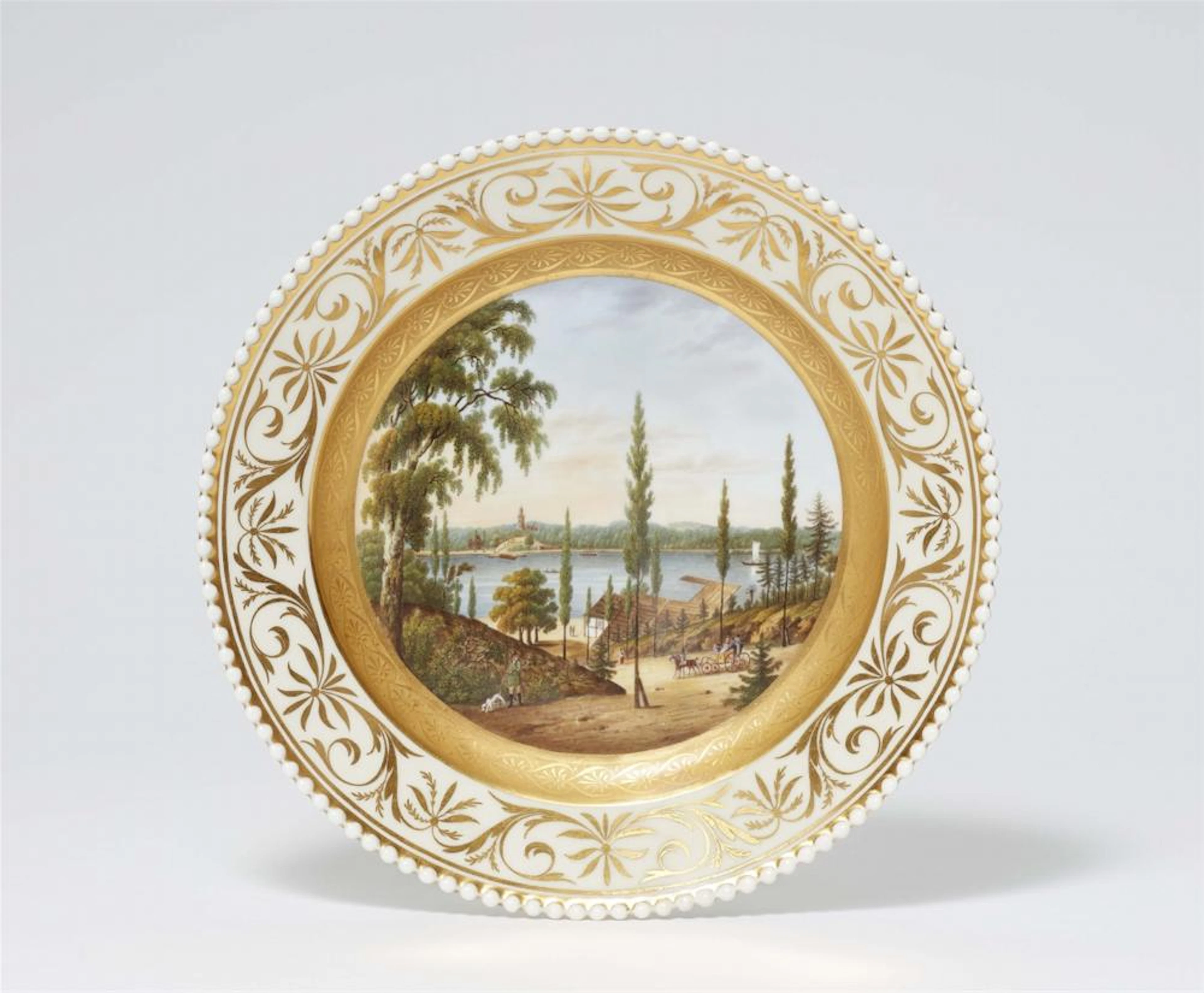 A Berlin KPM porcelain dessert plate with the “Passage to Peacock Island” from the wedding service for Princess Luise