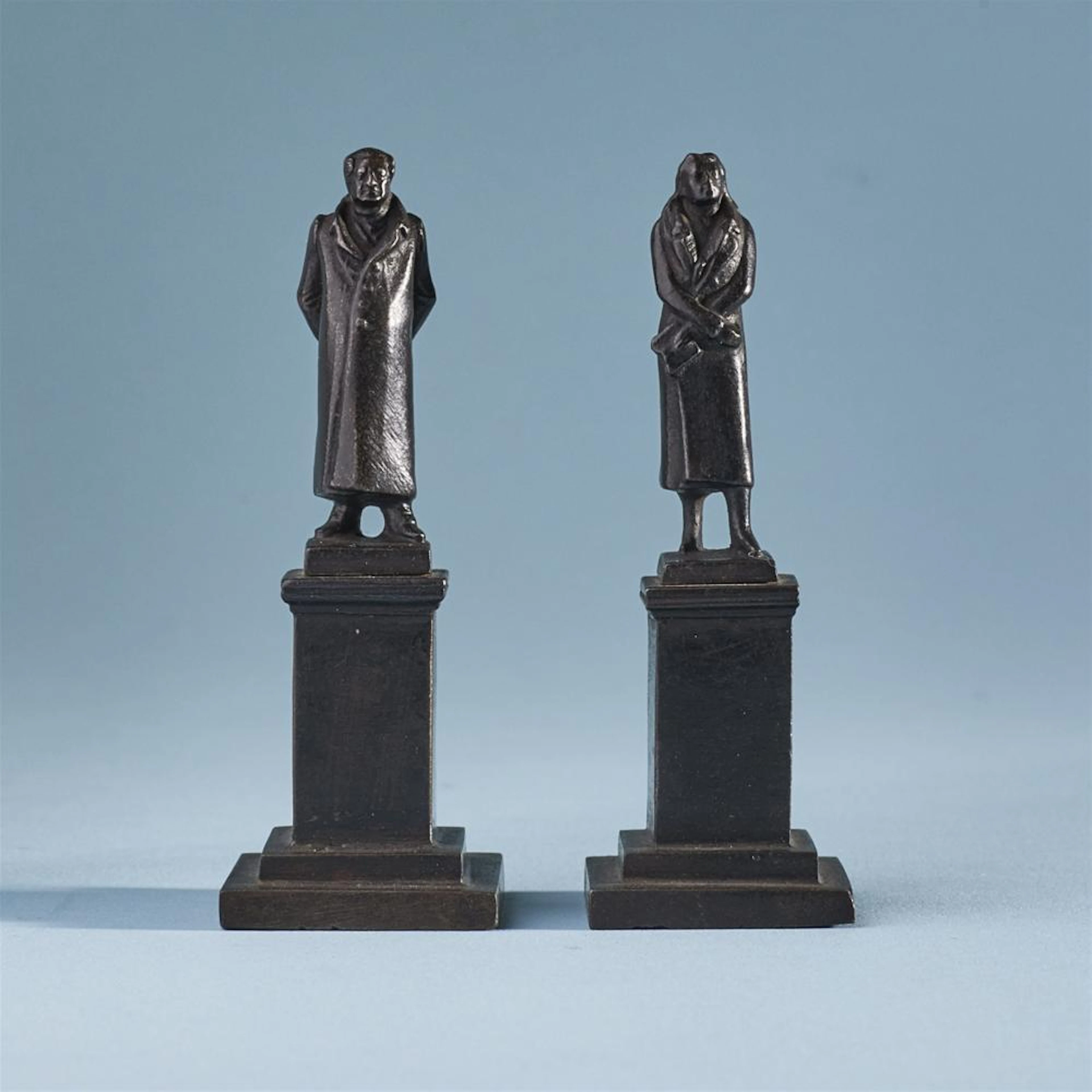 Two miniature cast iron statuettes of Goethe and Schiller