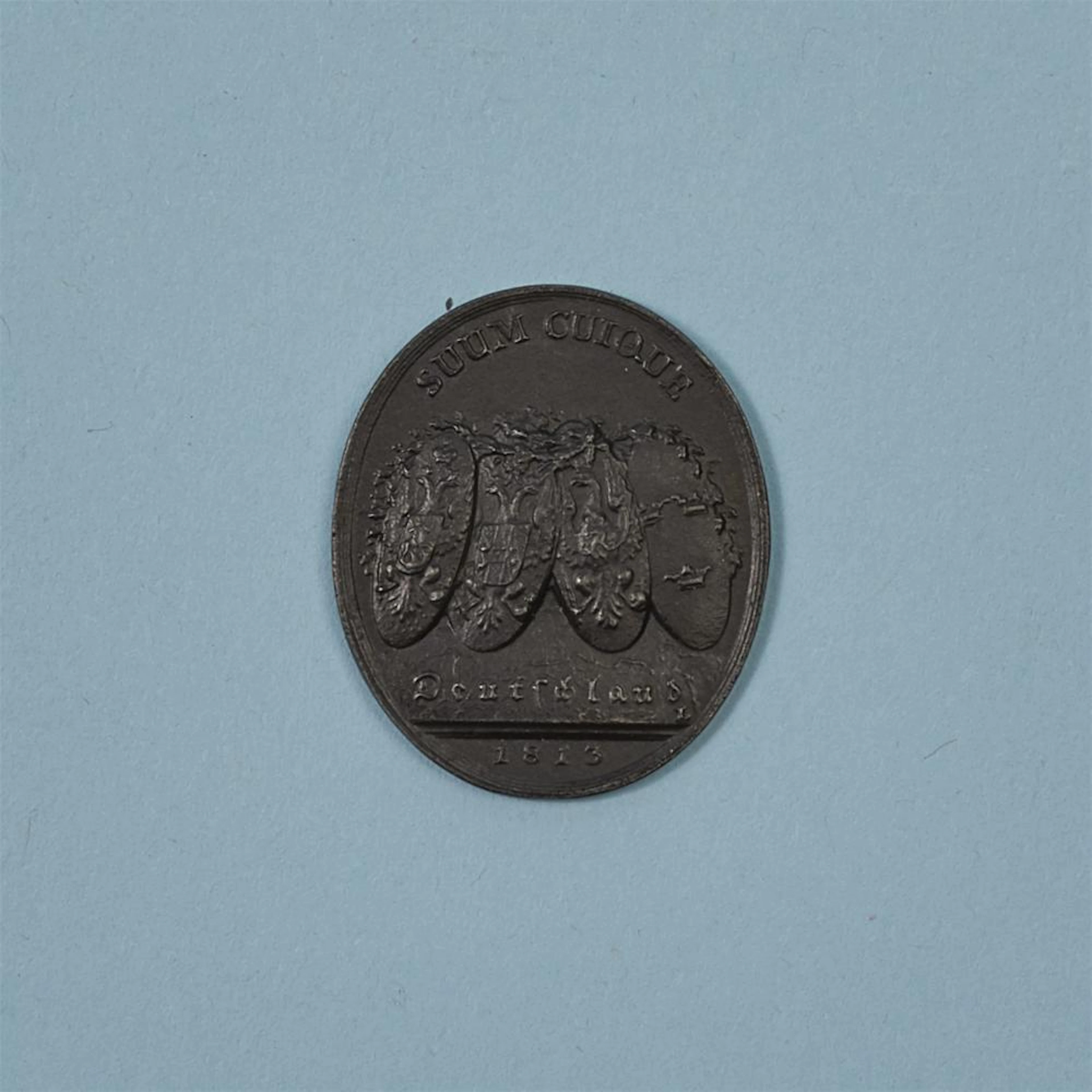 A cast iron medallion inscribed “Eine feste Burg ist unser Gott”