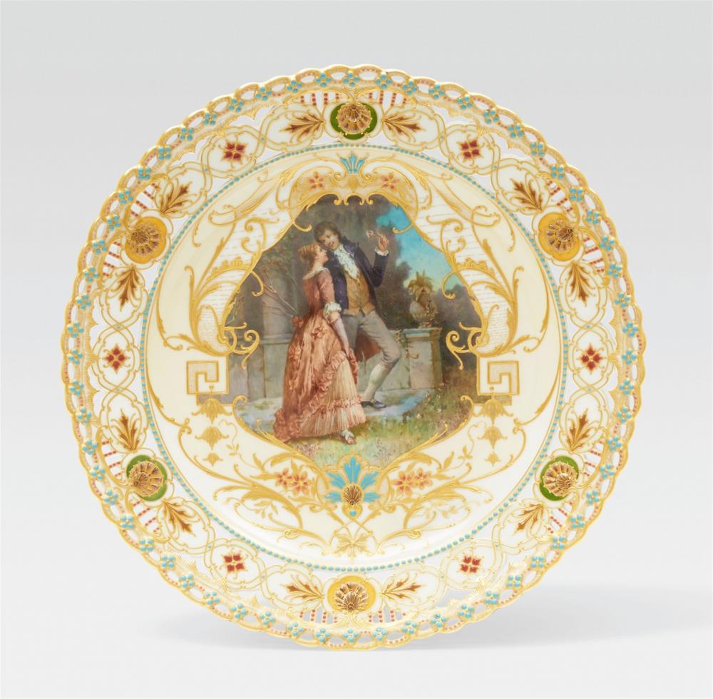 A Berlin KPM porcelain plate with an elegant couple