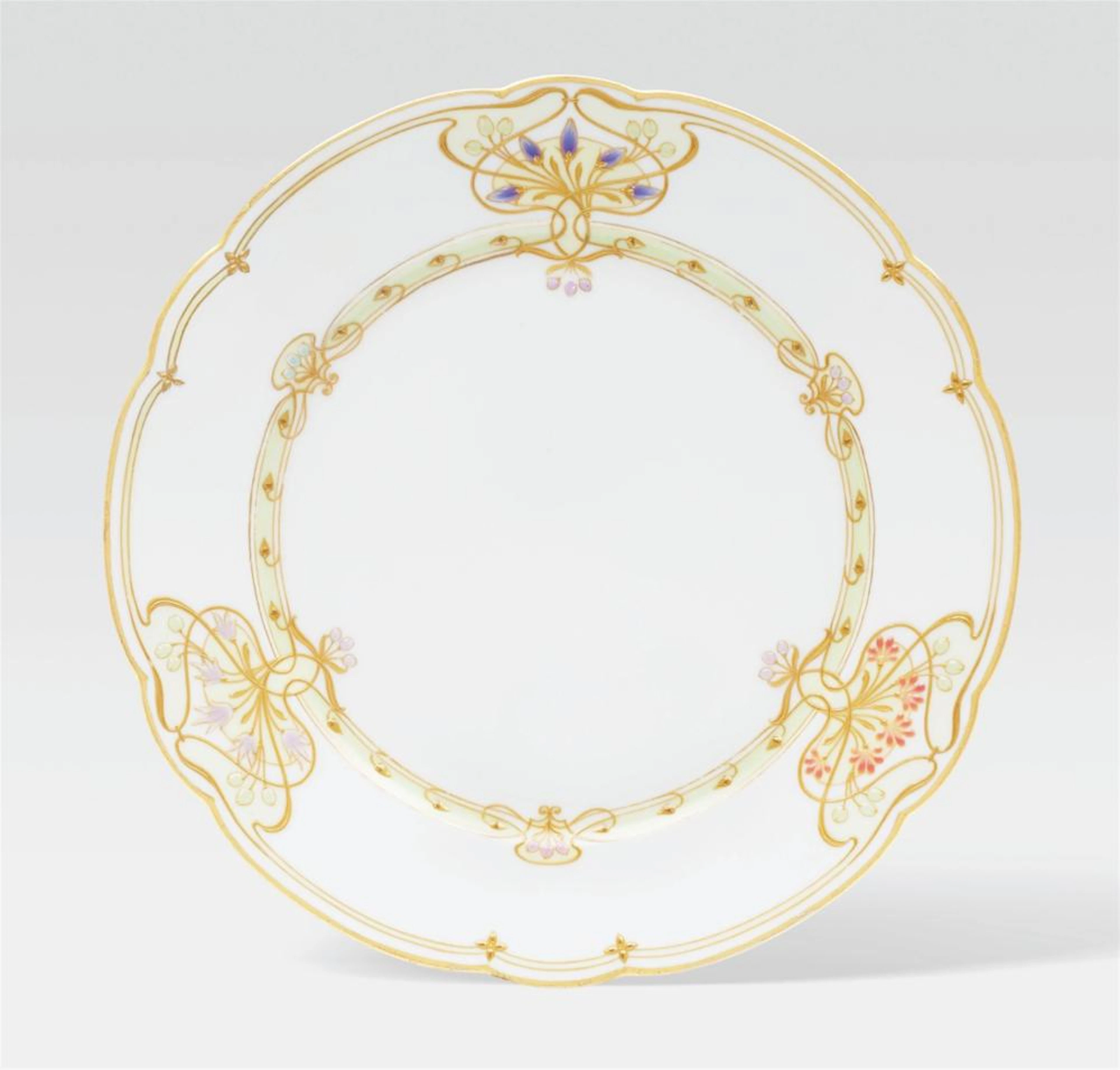 A Berlin KPM porcelain plate with Jugendstil relief decoration