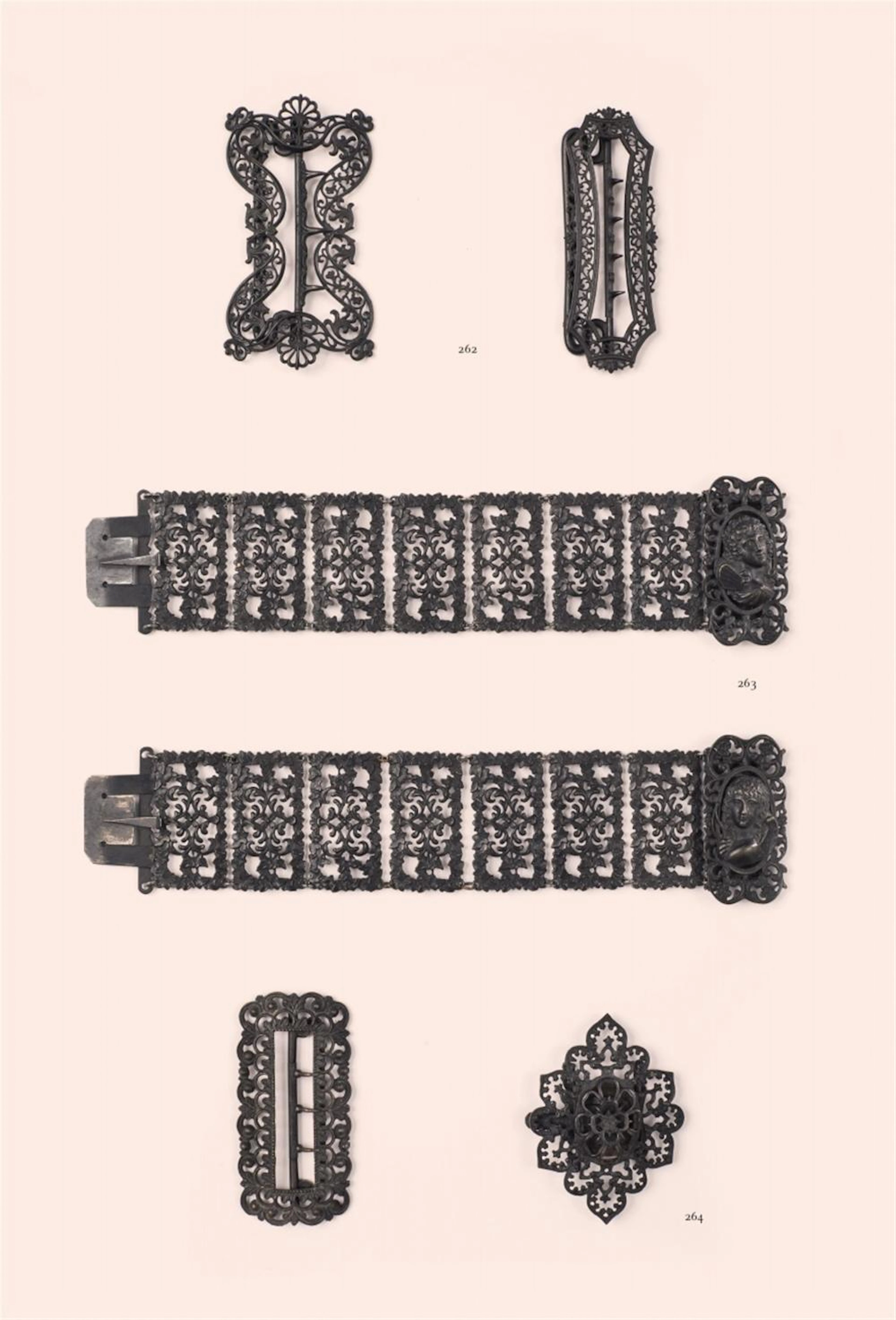 A pair of cast iron bracelets