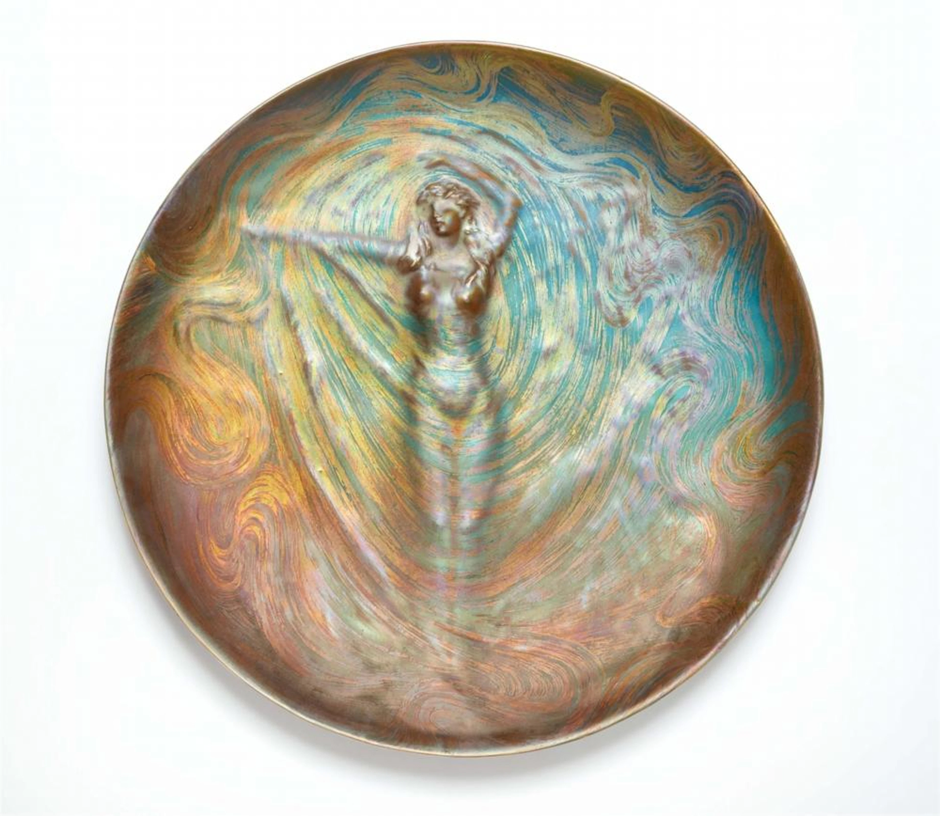 A unique ceramic dish depicting the dancer Loïe Fuller