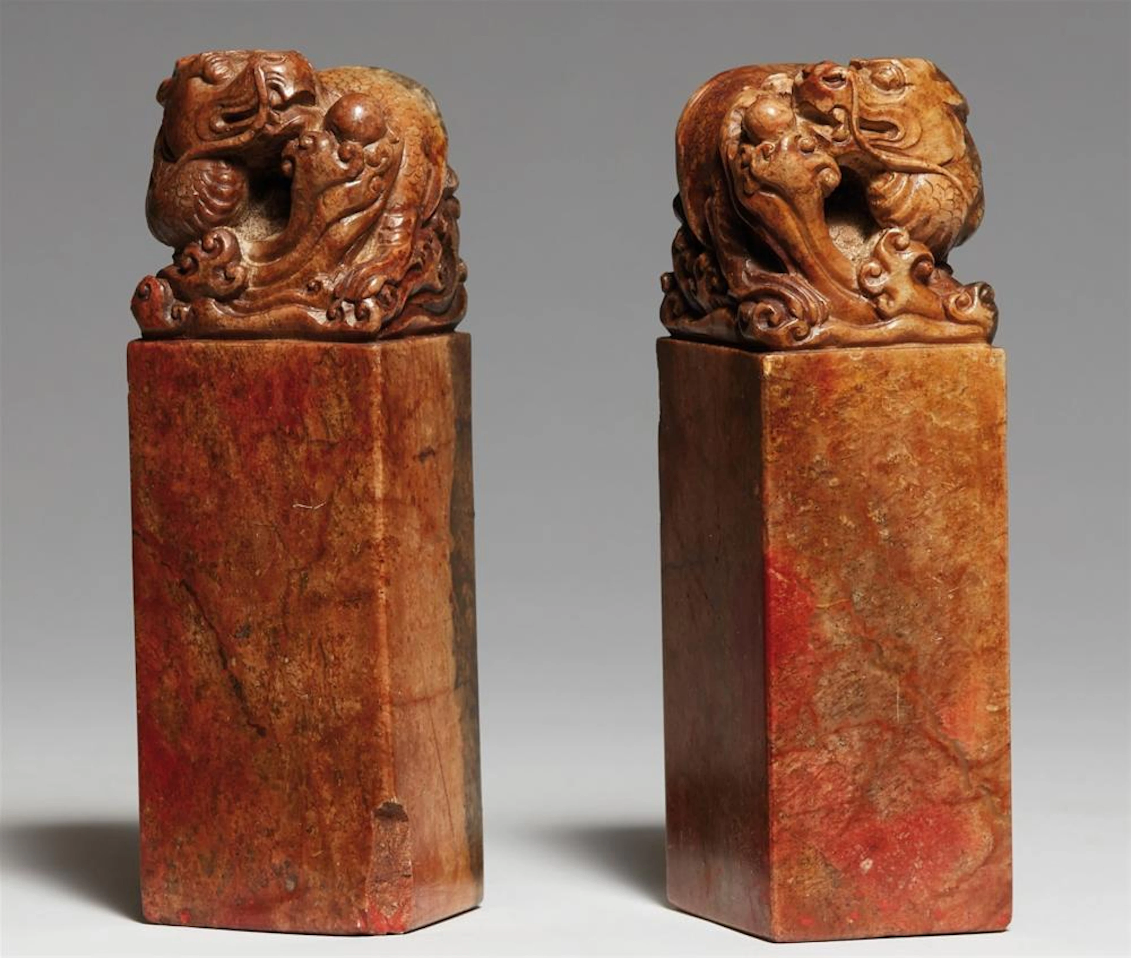 A large pair of soapstone seals. 20th century