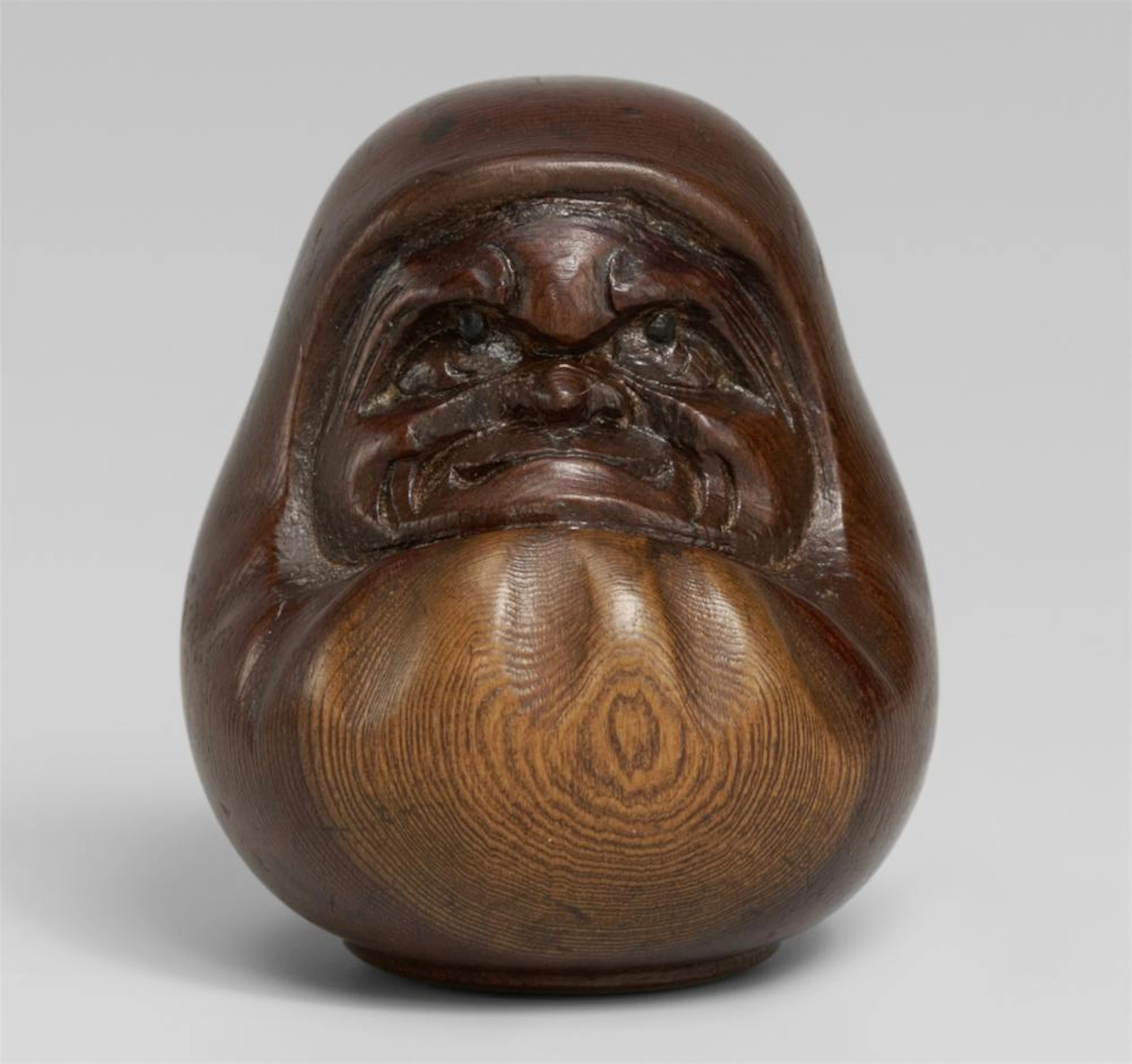 A yew wood netsuke of a Daruma doll, by Sukeyuki. Hida-Takayama. Around 1900