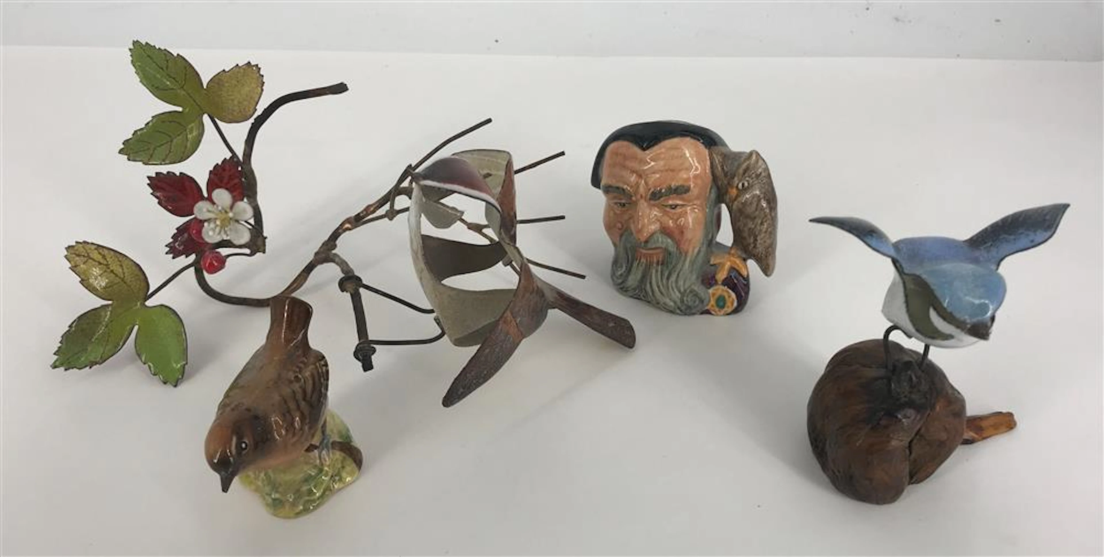 BOX LOT INCLUDING TWO BRUMM BIRD FIGURINES, A MINIATURE ROYAL DOULTON MERLIN PITCHER, AND A CERAMIC BIRD MADE IN BESWICK ENGLAND.