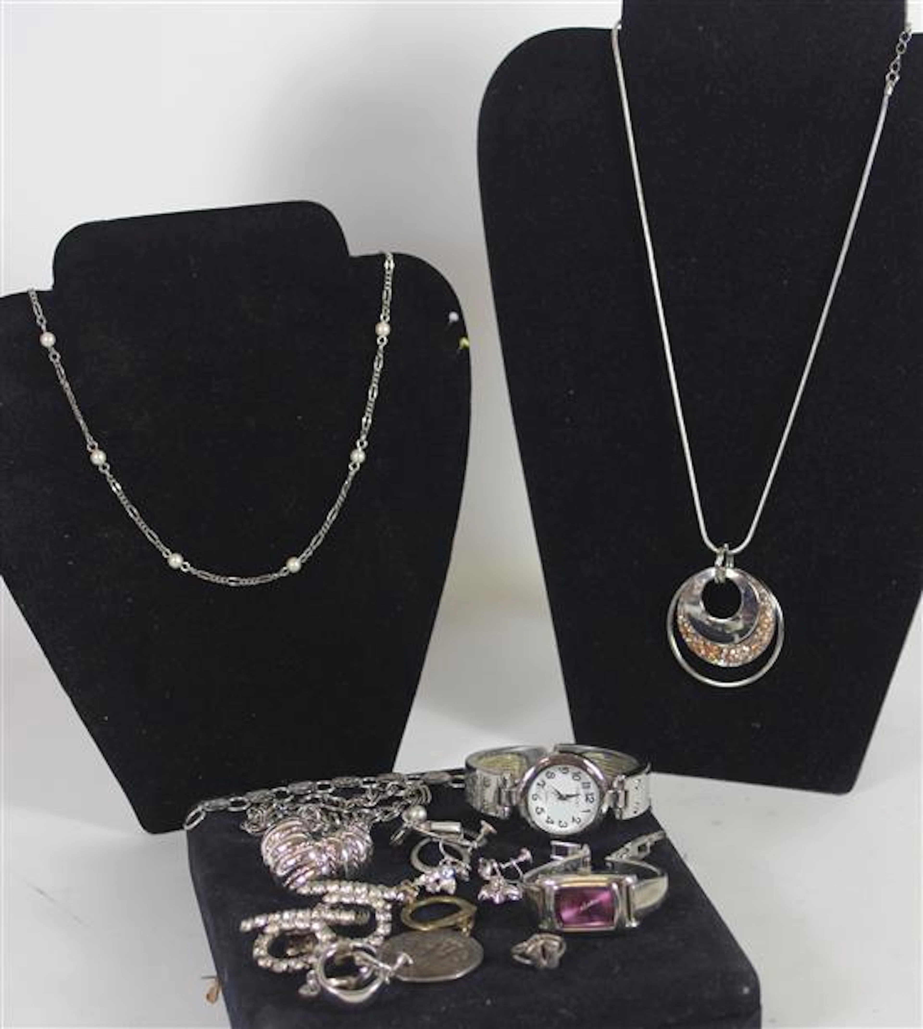 BOX LOT SILVER TONE JEWELRY INCLUDING: WATCHES FROM EMBASSY AND MINICCI, FIVE PAIRS EARRINGS, 1972 OLYMPIC KEY RING.