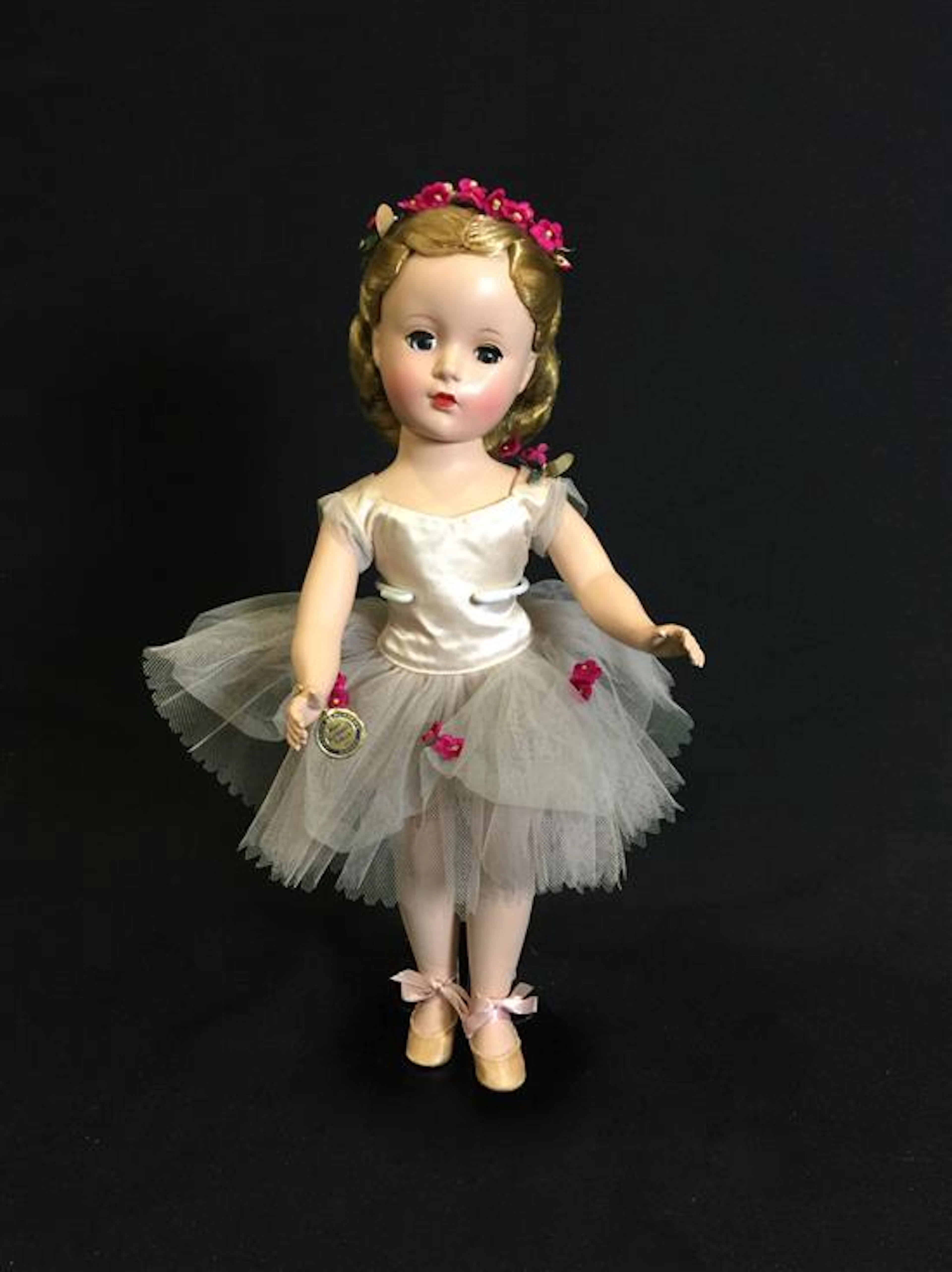 14" MADAME ALEXANDER BALLERINA HARD PLASTIC IN TAGGED OUTFIT. PINK OUTFIT INCLUDES APPLIED FLOWERS ON TULLE OF TUTU AND SHOULDER WI...