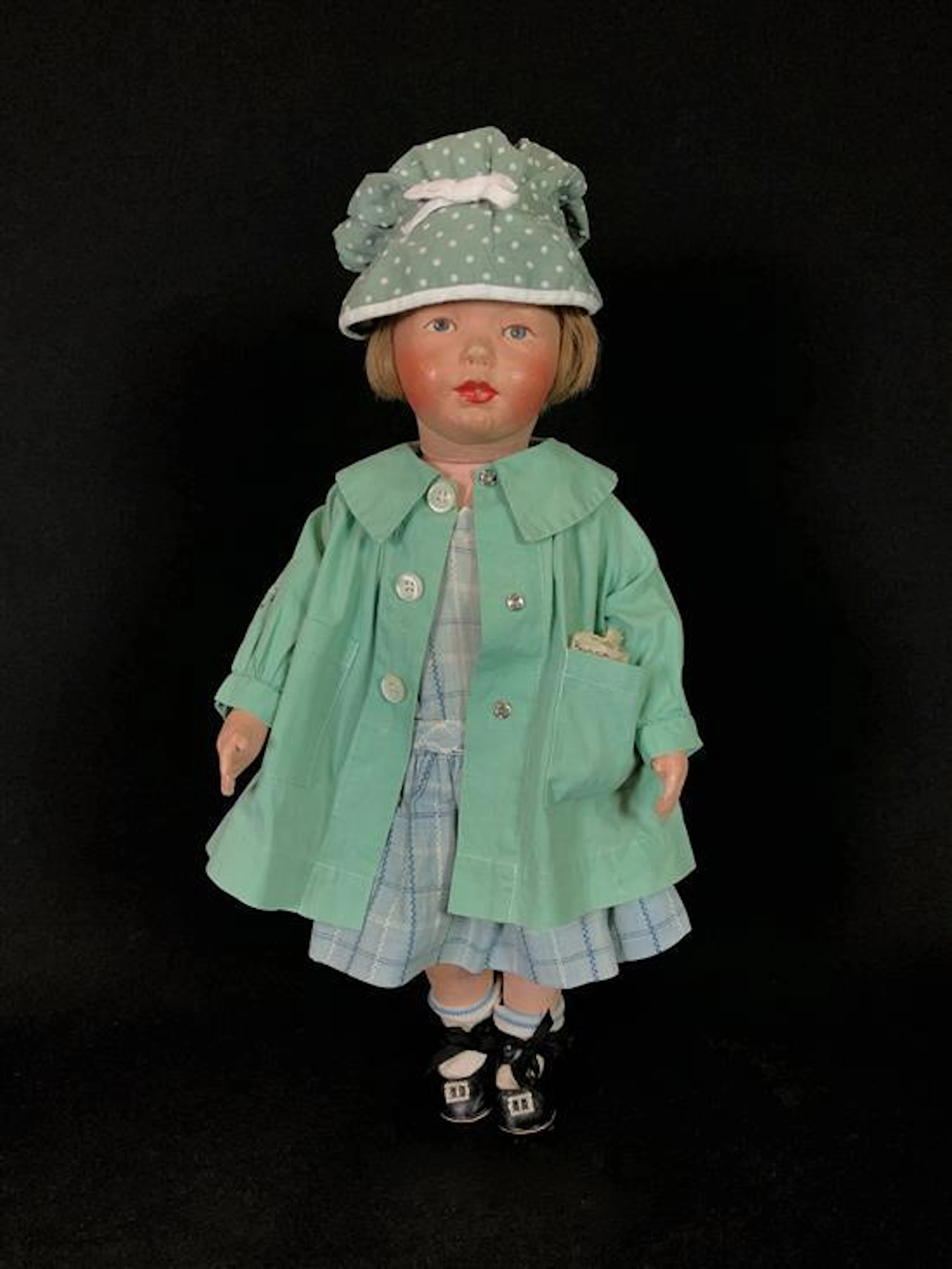 18" EARLY KAMKINS ALL CLOTH DOLLY. HUMAN HAIR WIG ON SWIVEL HEAD, MOLDED MASK FACE WITH PAINTED FEATURES. BODY DISC JOINTED AT HIPS...