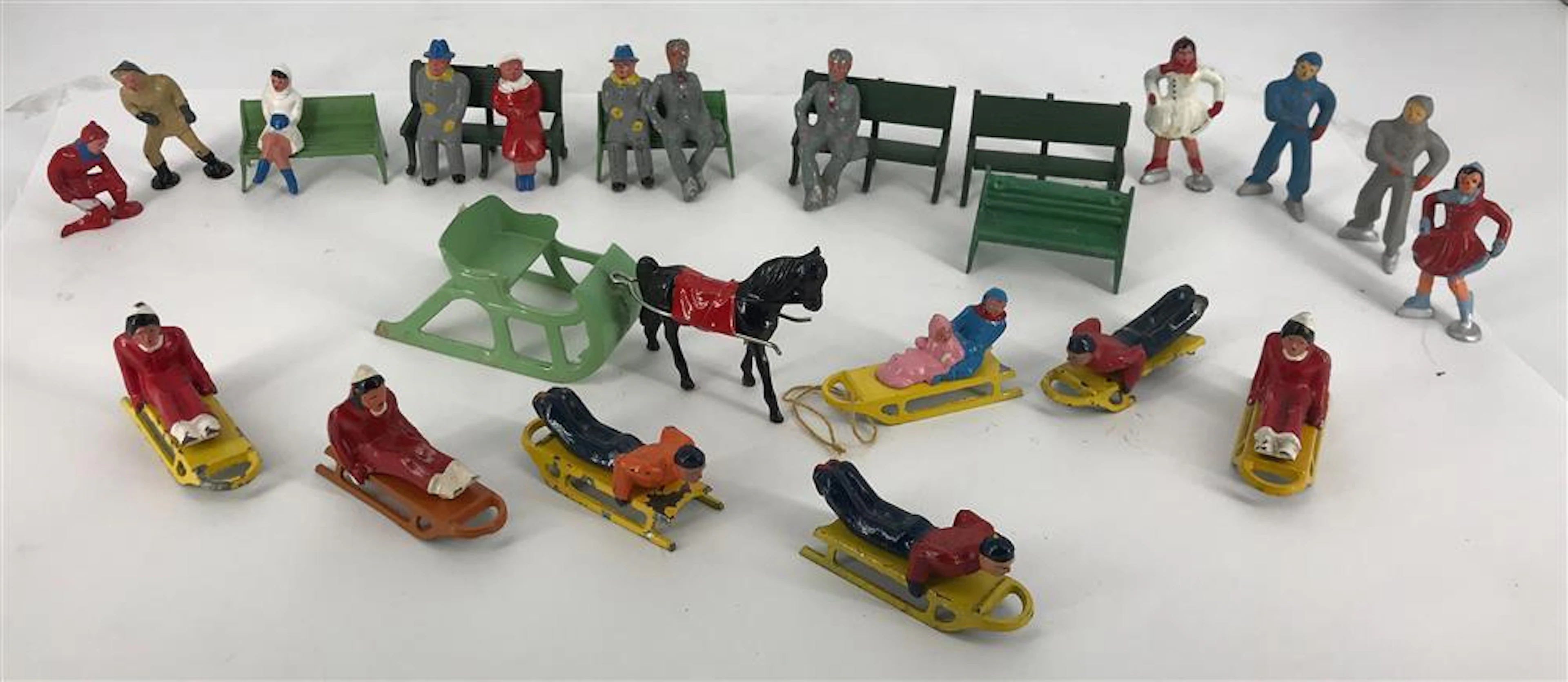 BARCLAY WINTER FIGURES (19 FIGURES, 7 SLEDS, HORSE AND SLEIGH, 3 BENCHES) STANDARD GAUGE