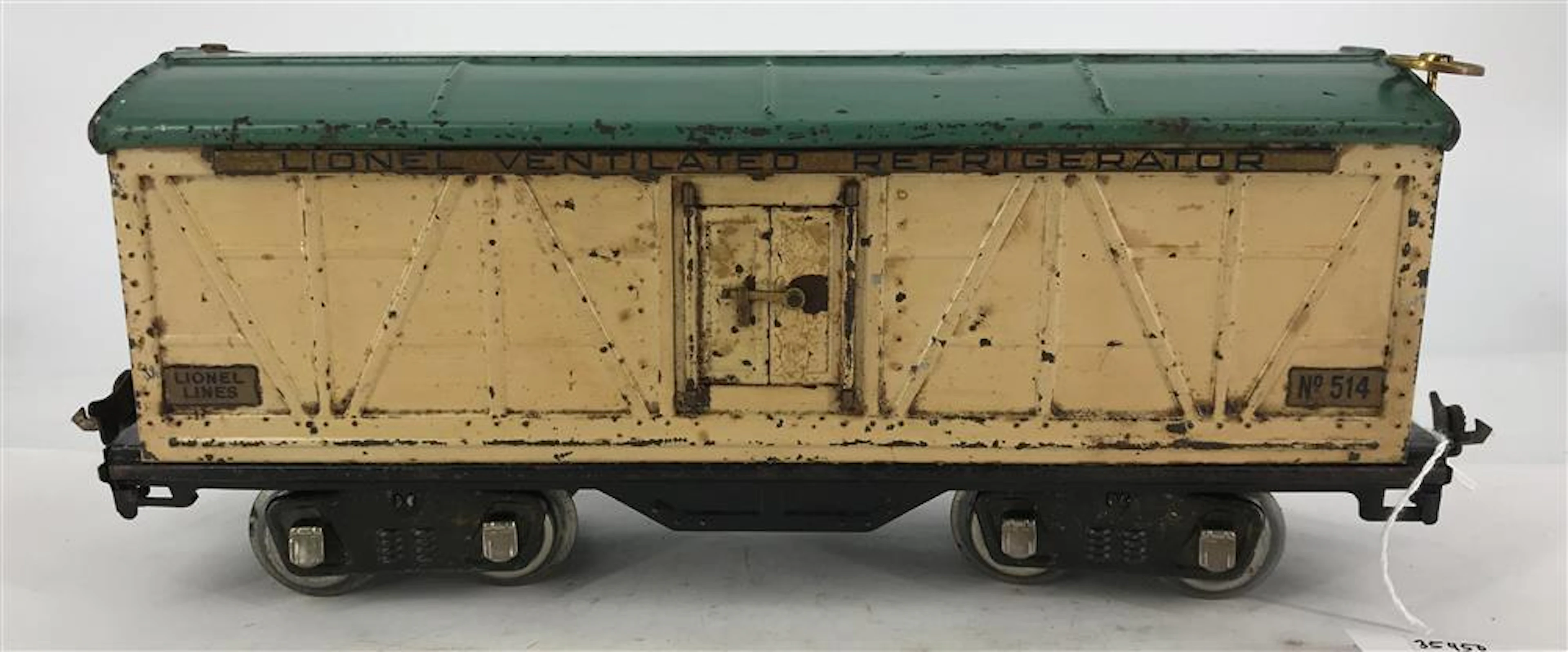 LIONEL PRE-WAR STANDARD GAUGE 514 BOXCAR, IVORY WITH PEACOCK ROOF