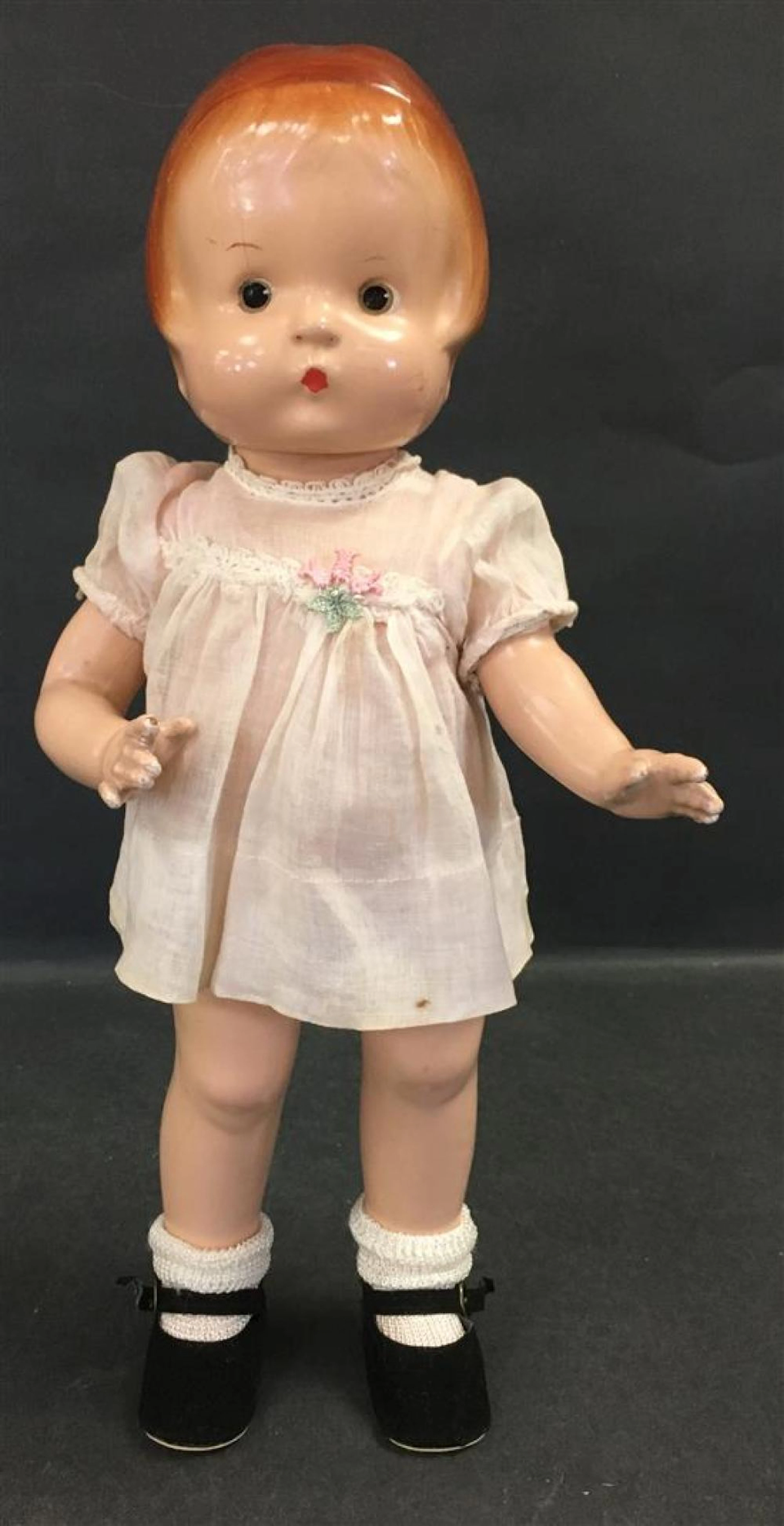 13" VINTAGE EFFANBEE ALL COMPOSITION PATSY. MOLDED AND PAINTED HAIR AND FACIAL FEATURES WEARING VINTAGE PINK DRESS WITH FLORAL APPL...