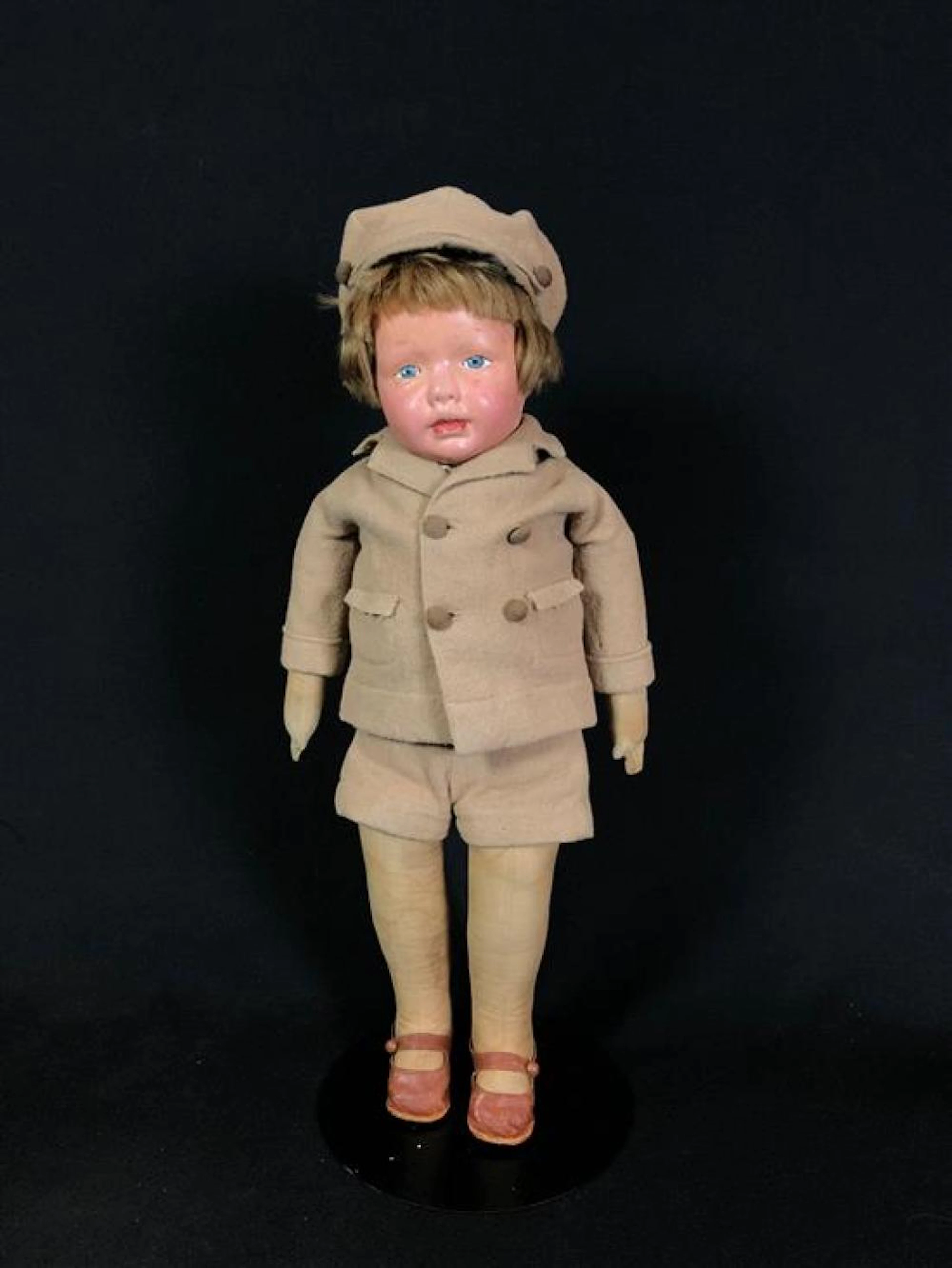 18" KAMKINS ALL CLOTH BOY IN LIKELY ORIGINAL COSTUME. MOHAIR WIG, MOLDED MASK FACE WITH PAINTED FEATURES. ABOVE EAR STAMPED "KAMKINS...