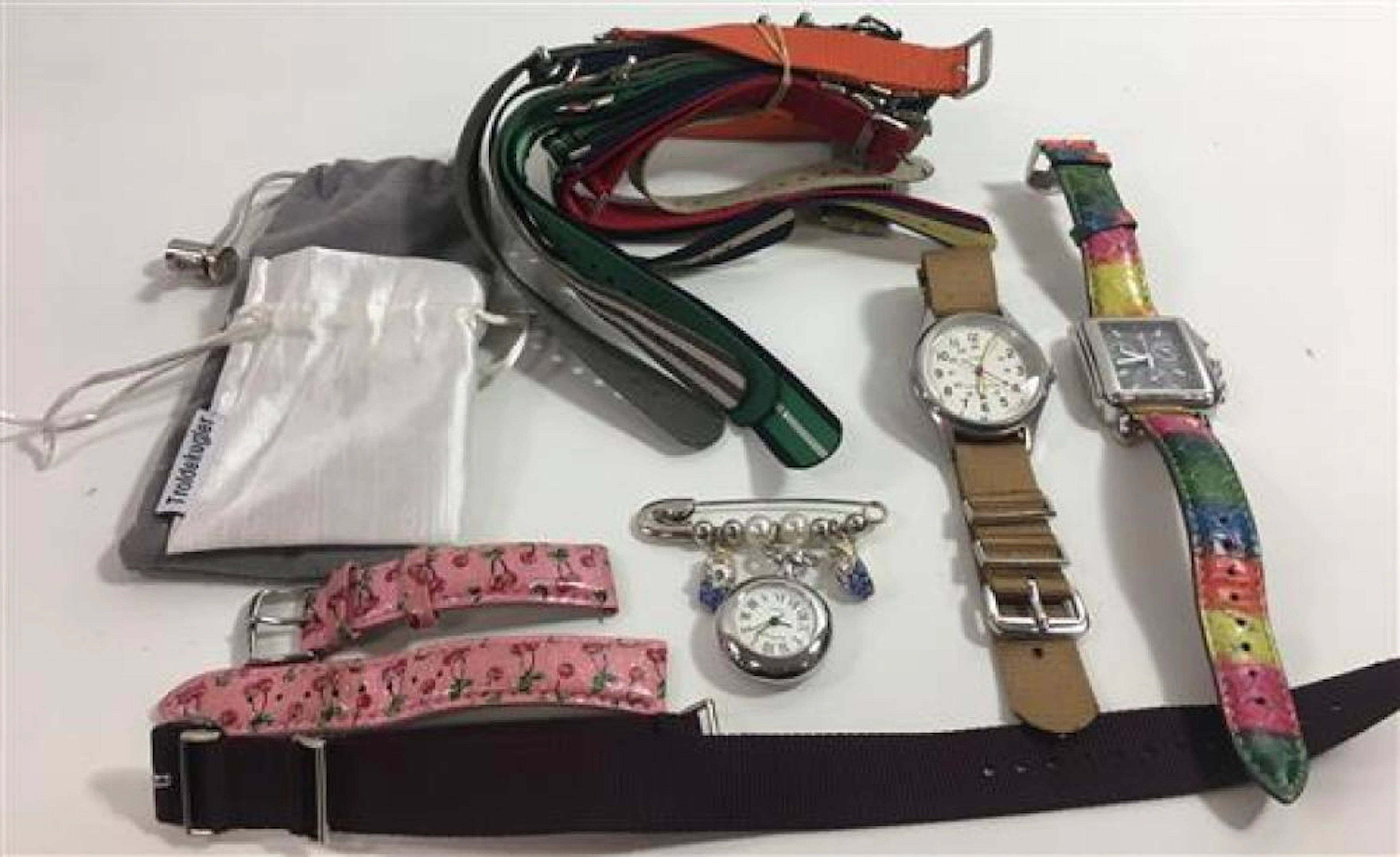 THREE WATCHES & 11 BANDS