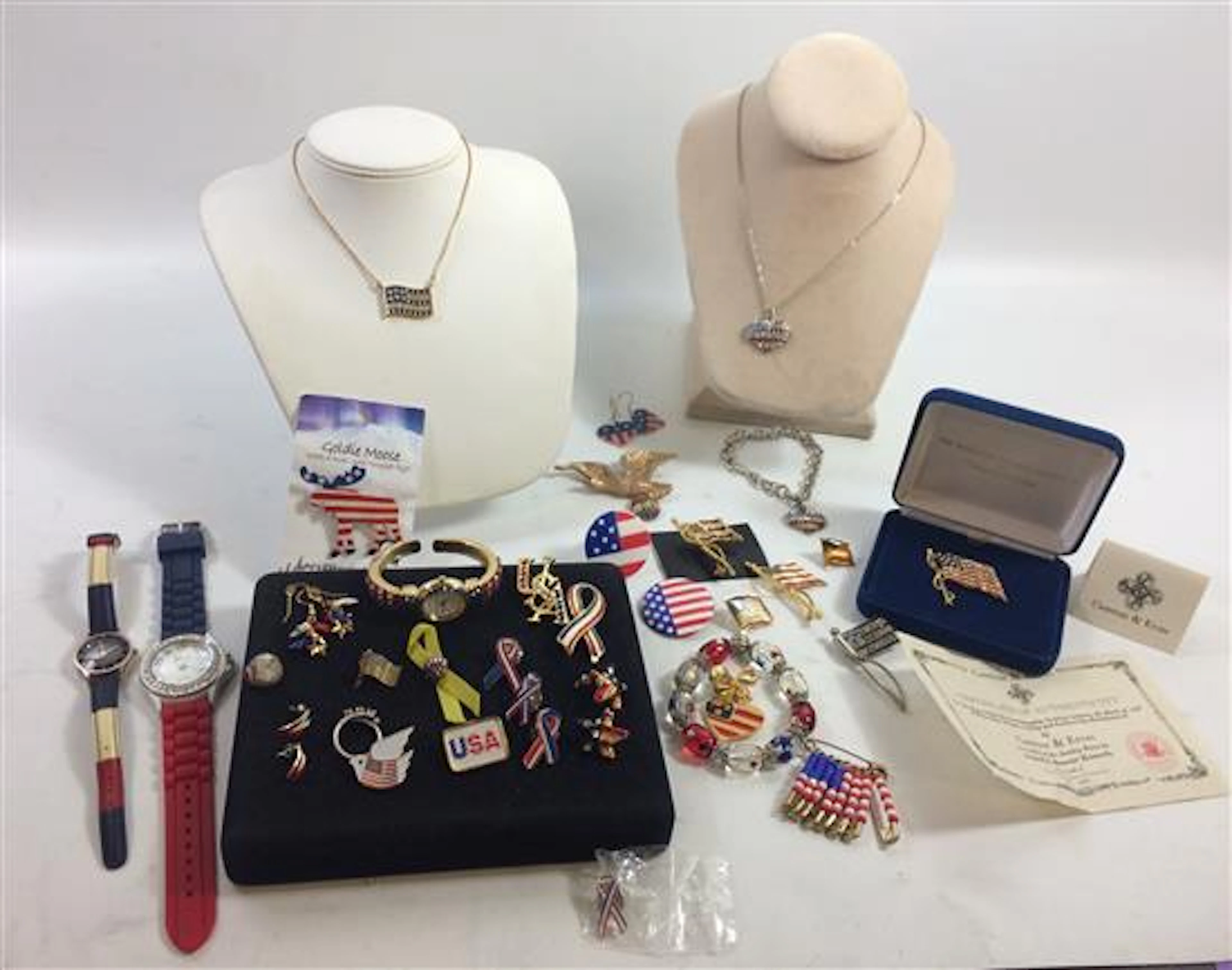BOX LOT PATRIOTIC JEWELRY INCLUDING COLLEZIO AND GENEVA WATCHES, FLAG PINS, AND EARRINGS
