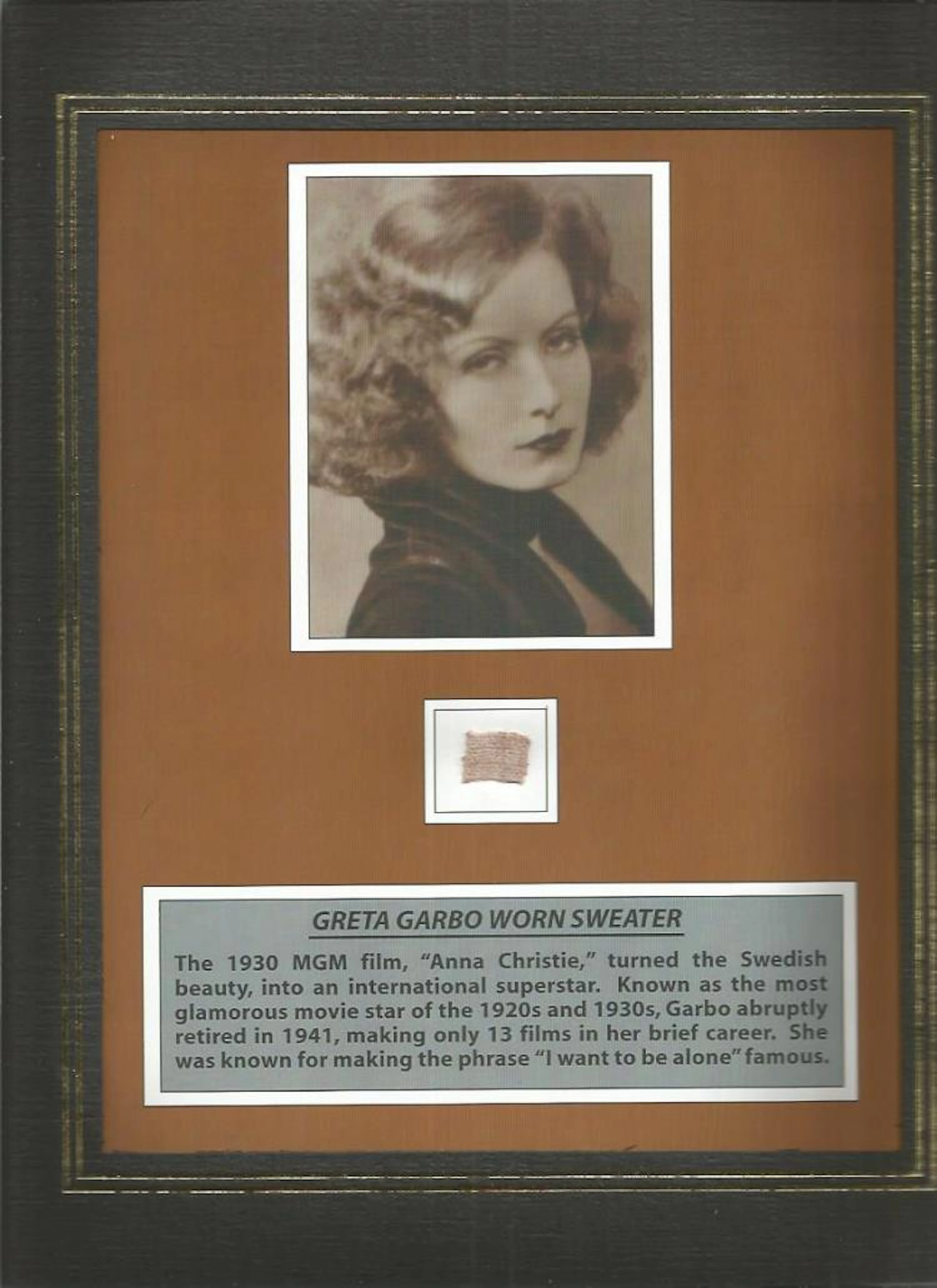 Greta Garbo memento display 12 x 10 inch mounted with a swatch of her personally worn tan sweater
