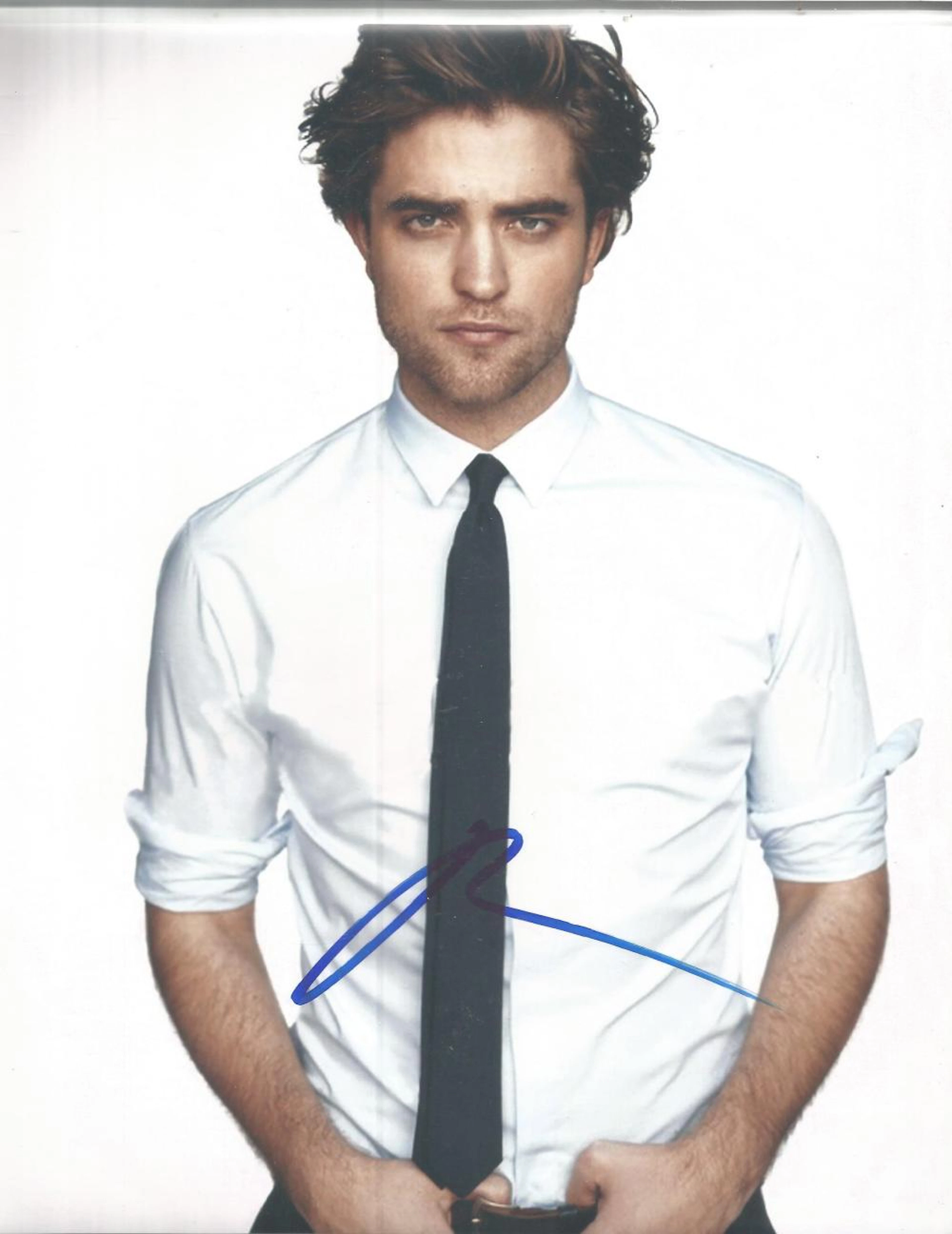 Robert Pattinson signed 10x8 colour photo. Good Condition. All signed pieces come with a Certificate