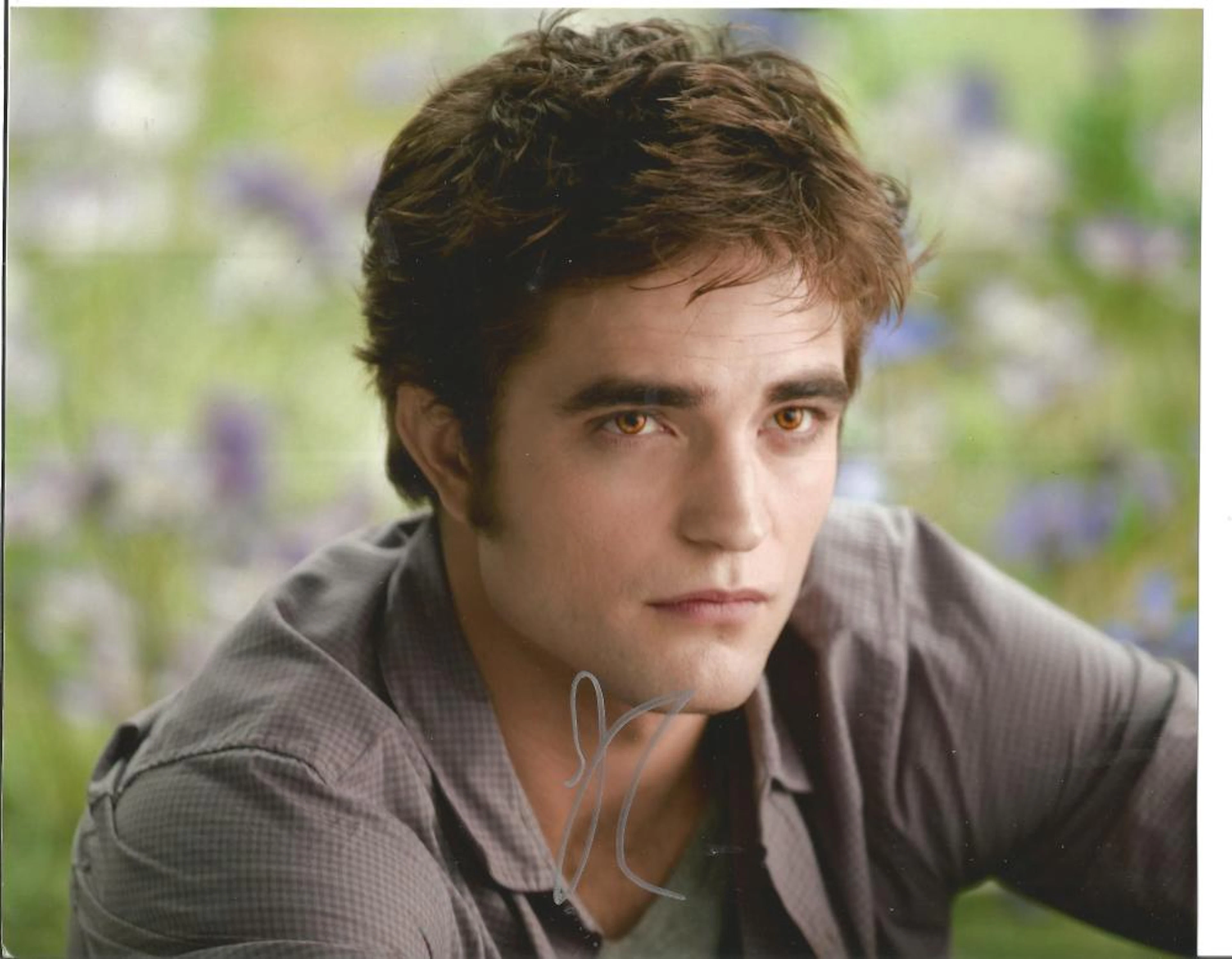 Robert Pattinson signed 10x8 colour photo. Good condition. All autographs come with a Certificate of