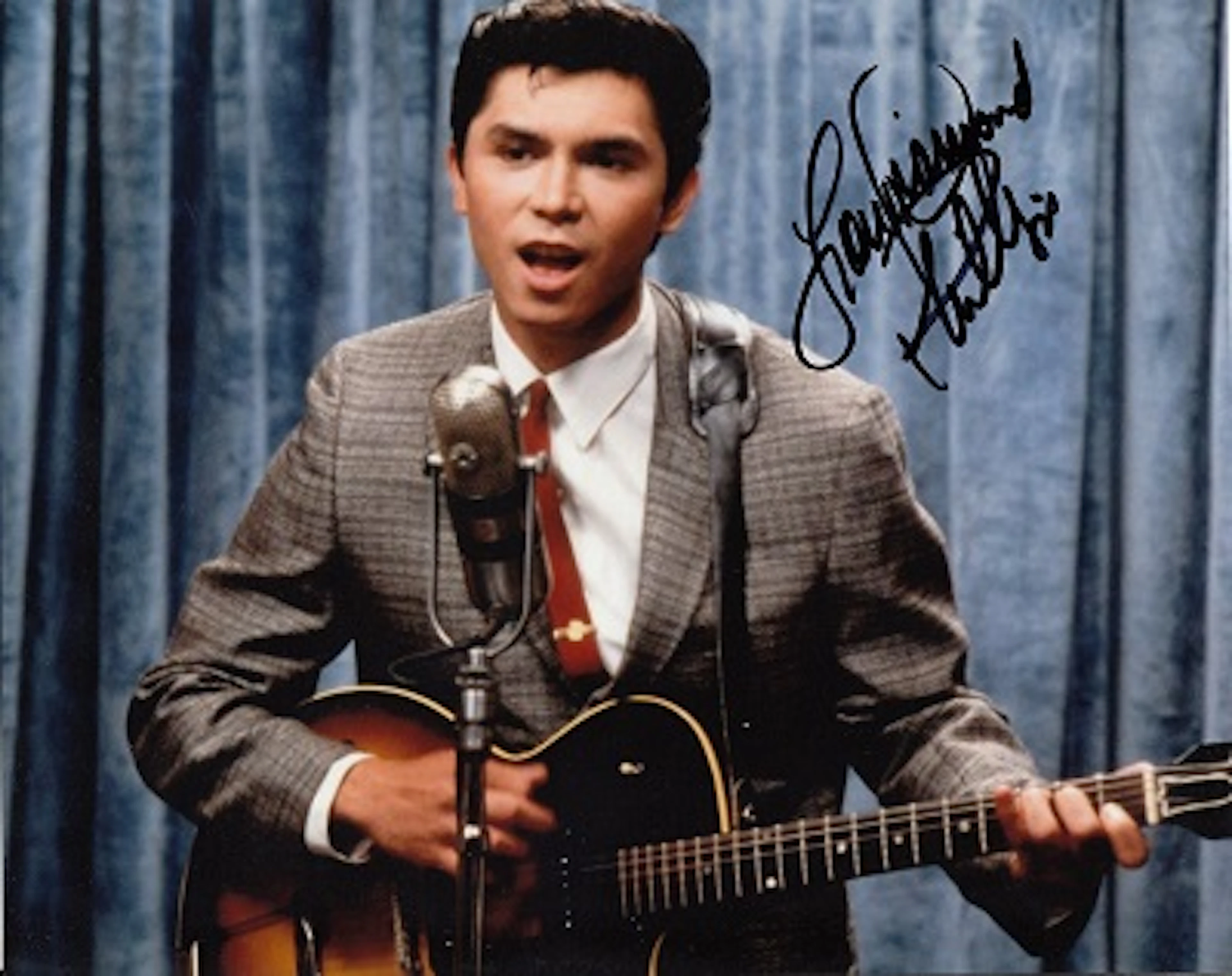 Lou Diamond Phillips signed 10 x 8 colour photo from La Bamba. American actor and director. His breakthrough came when he starred as Ritchie Valens in the biographical drama film La Bamba 1987