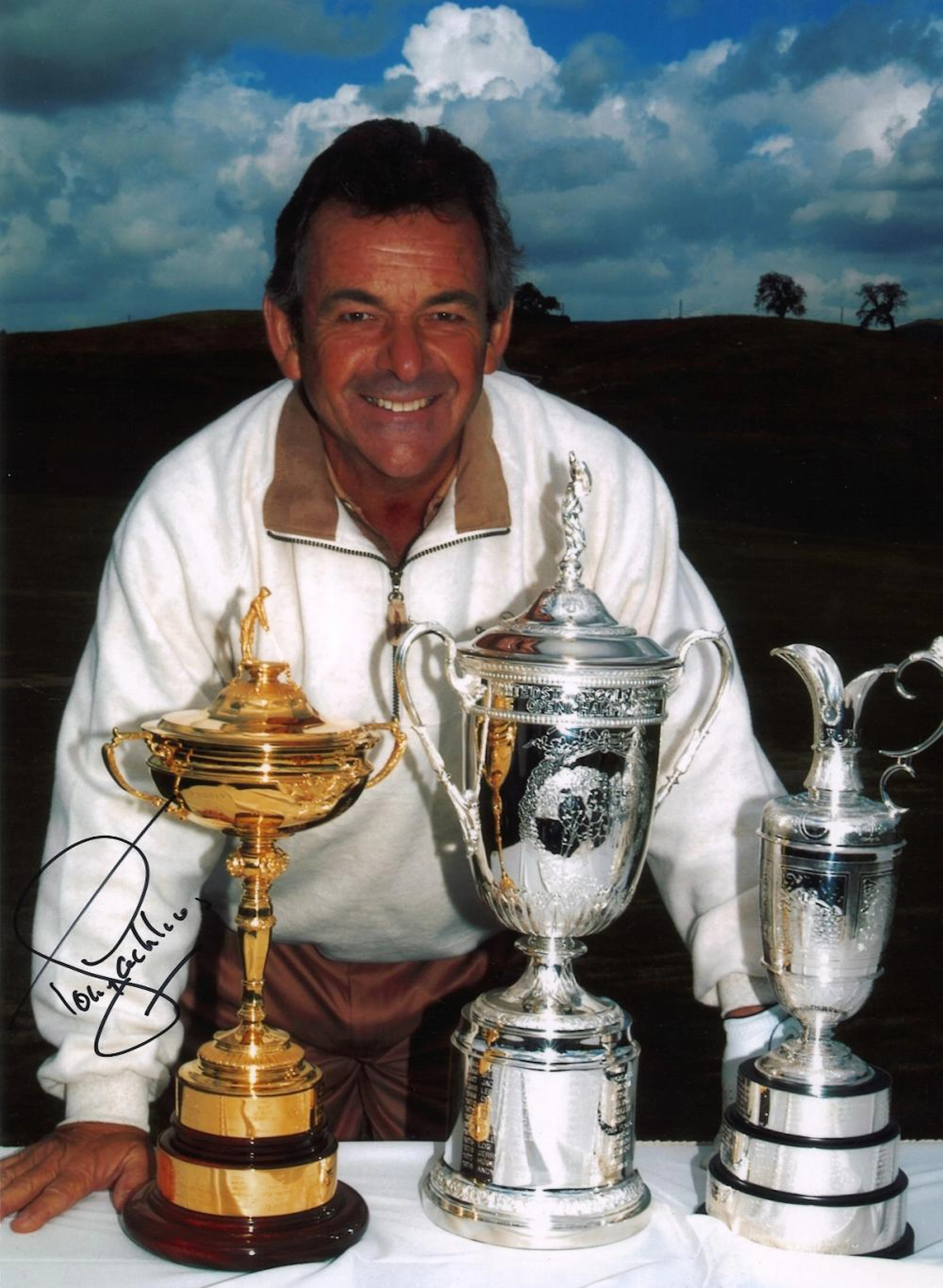 Golf Tony Jacklin signed 16x12 colour photo pictured standing behind The Ryder Cup, US Open trophy